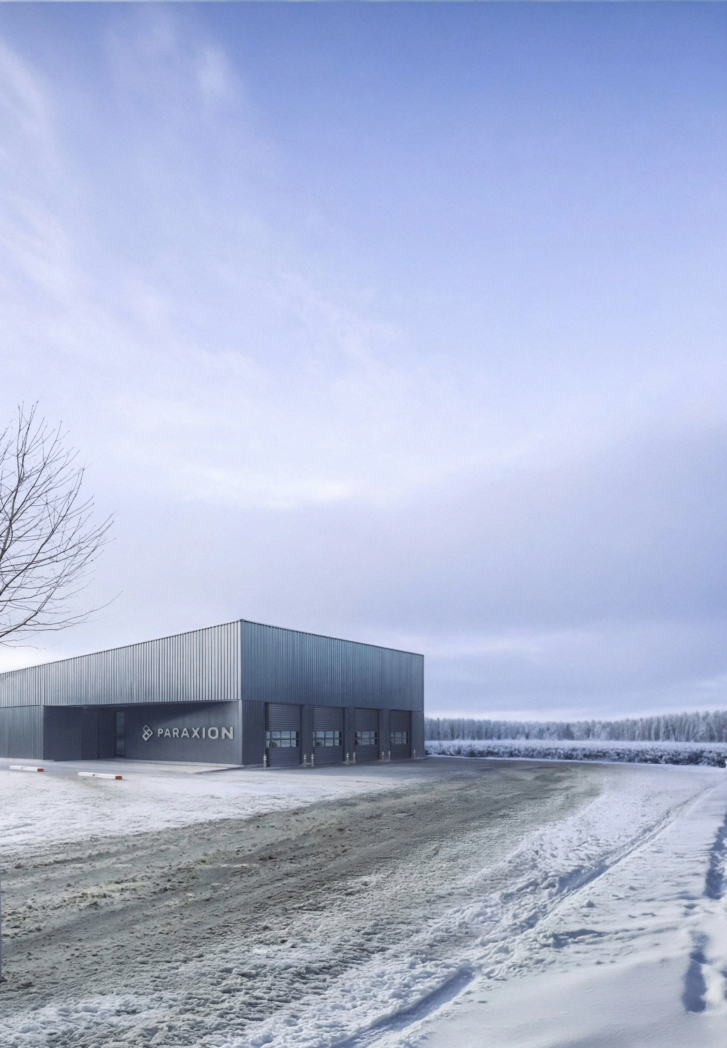 Un bâtiment industriel gris dans un paysage enneigé avec un ciel nuageux, portant le nom 'Paraxion'.
