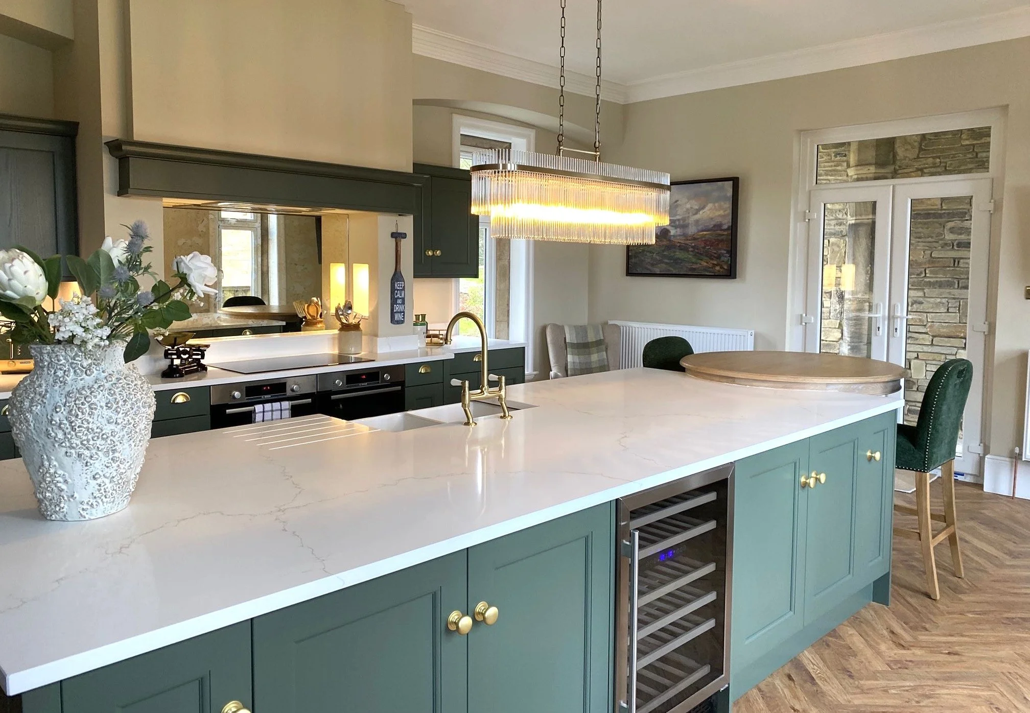 Antique Glass sits behind the stove area