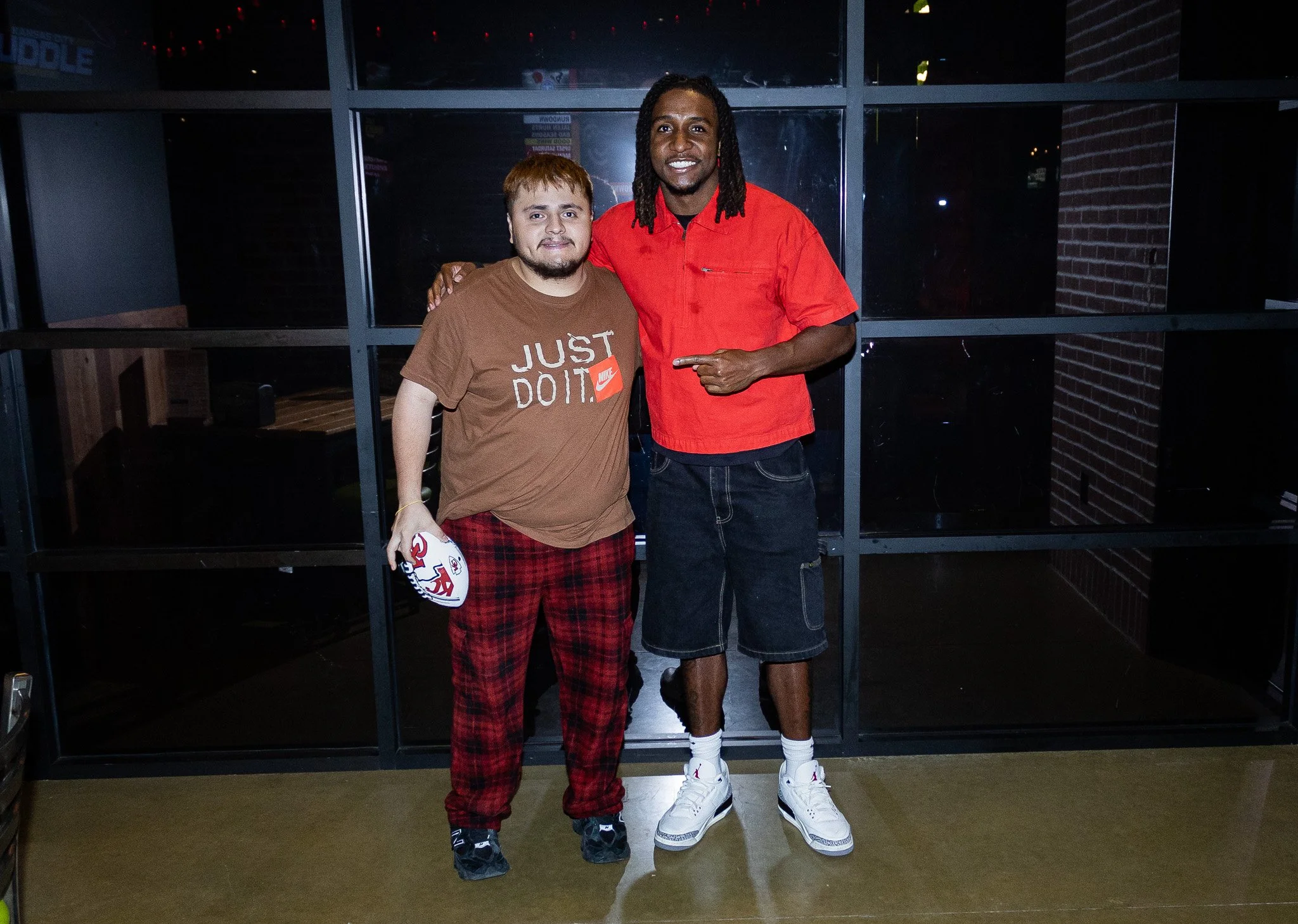 Kansas City defensive back Nohl Williams meets attendees during the Kansas City Huddle meet and greet.