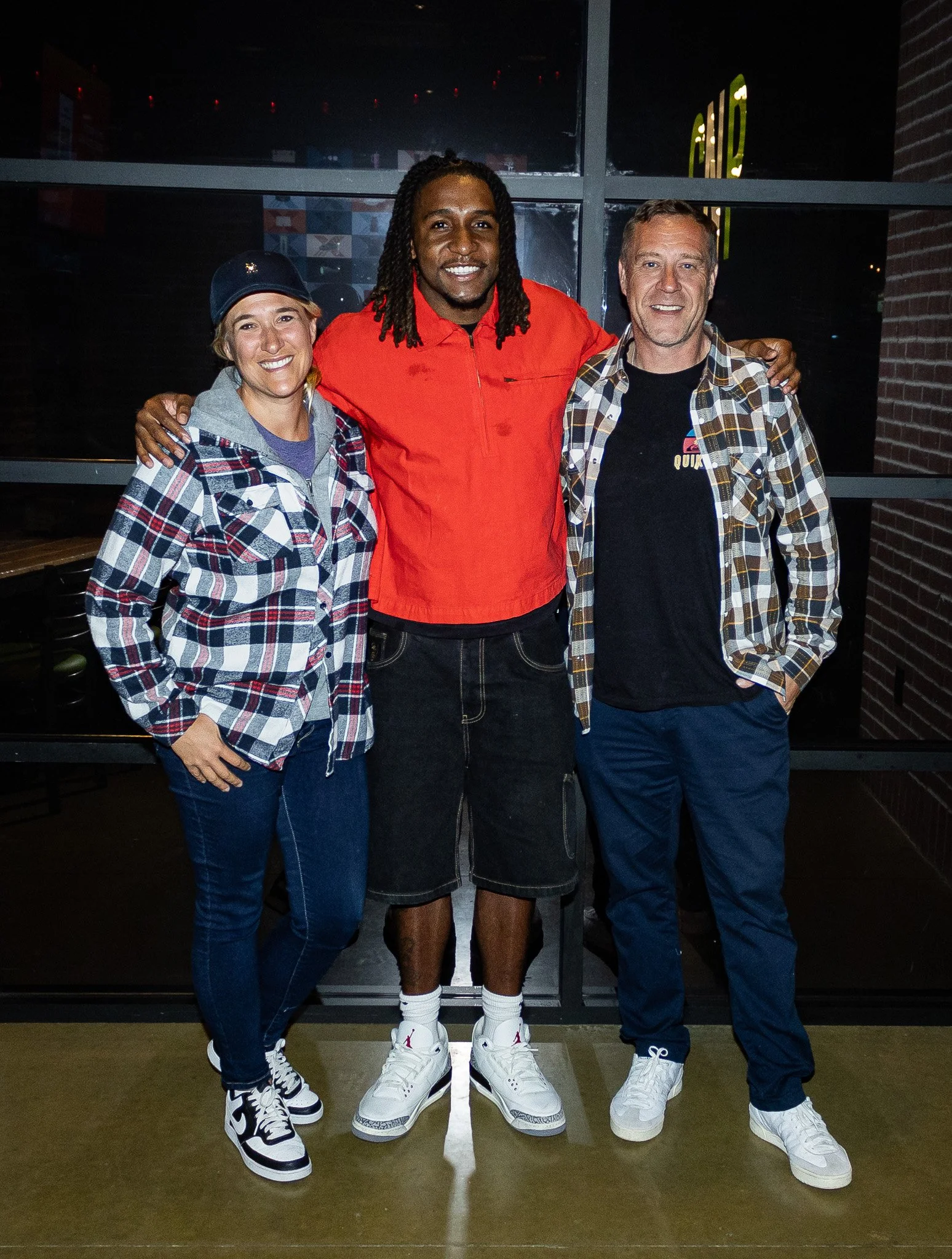 Guests take a photo with Nohl Williams following his Kansas City Huddle appearance.