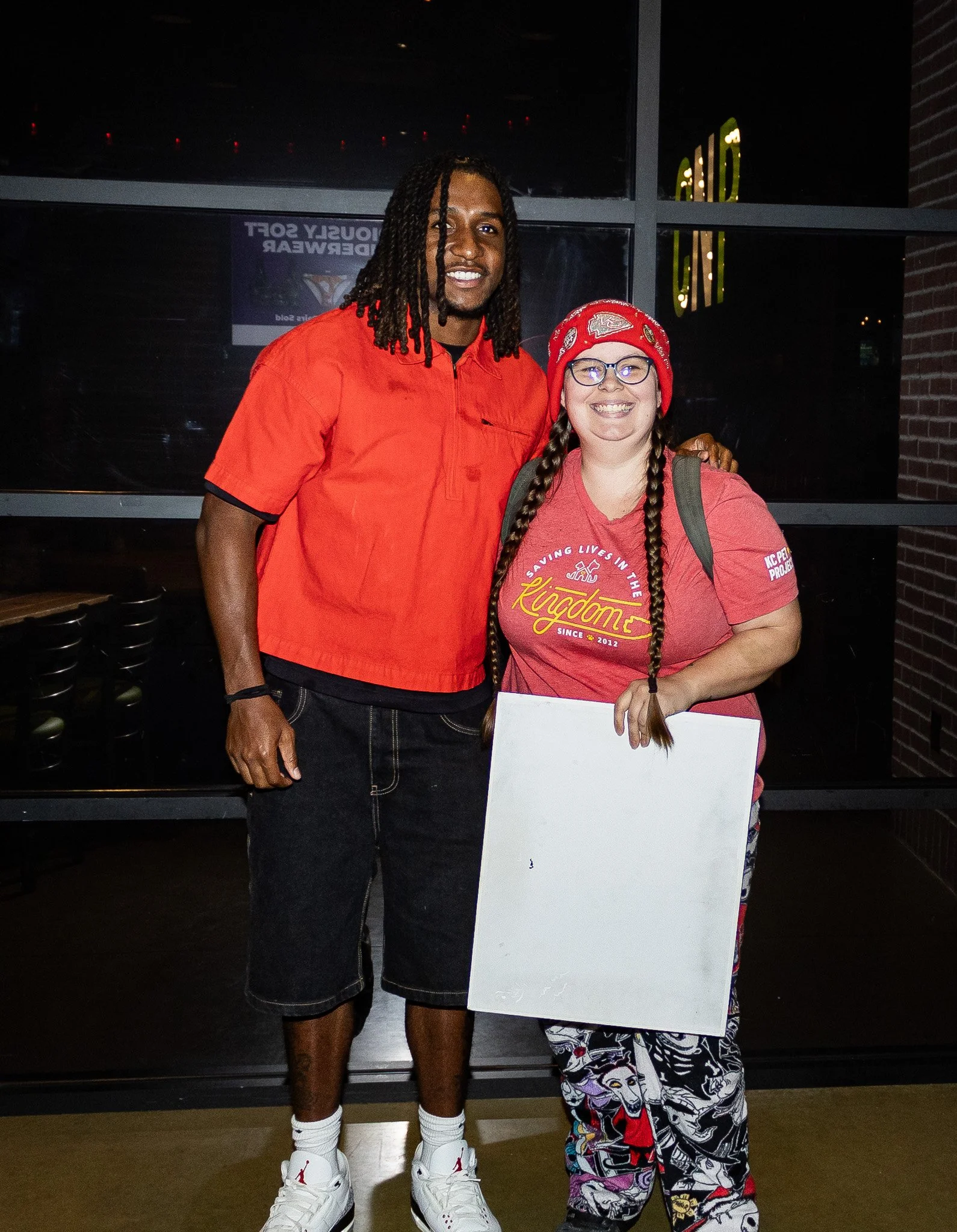 Nohl Williams poses with a fan after Kansas City Huddle in Overland Park