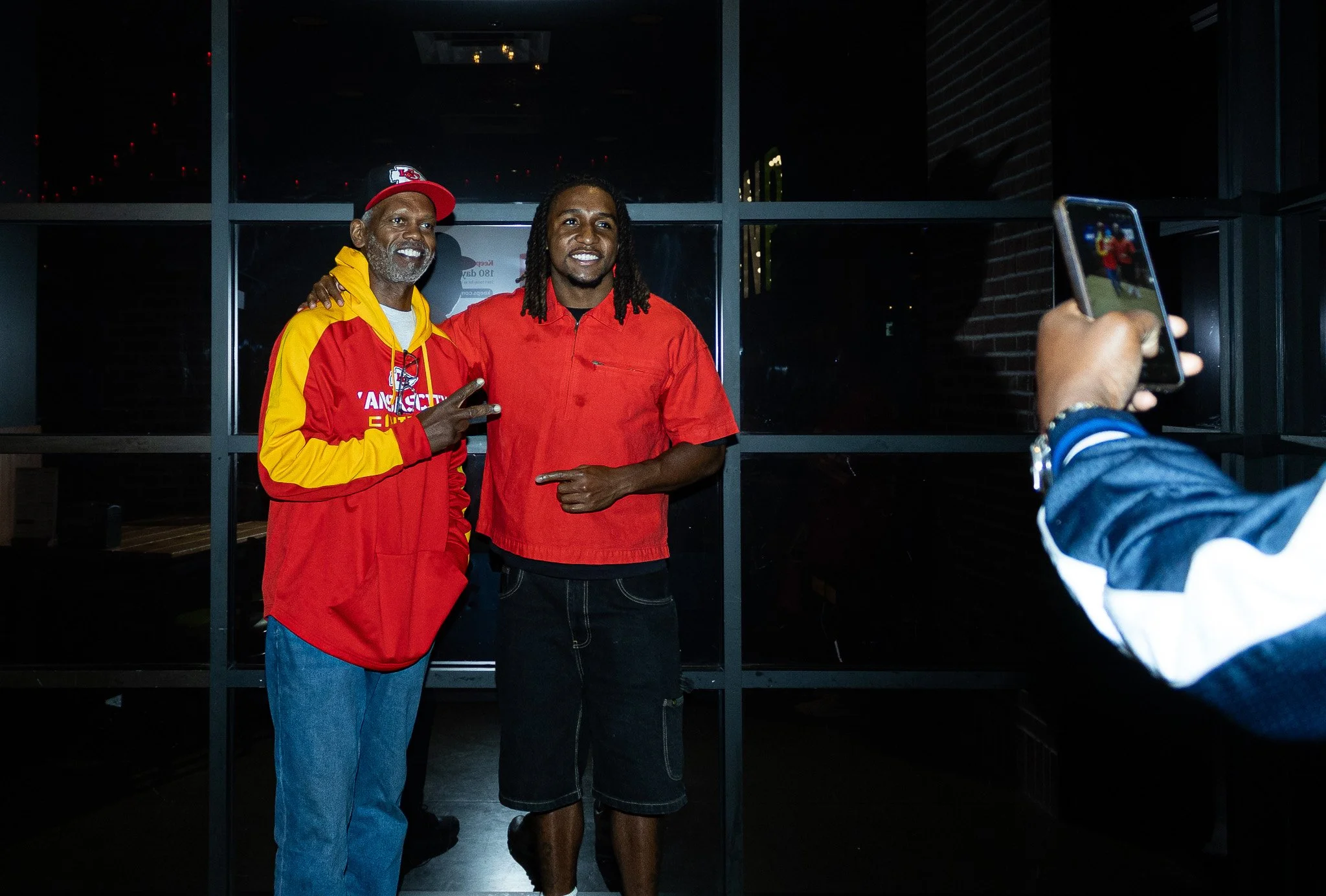 Nohl Williams poses for a photo with fans after the Kansas City Huddle live show.