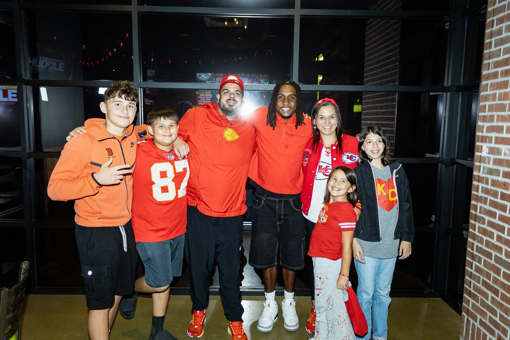 Nohl Williams and members of the Kansas City Huddle audience gather for a group photo.