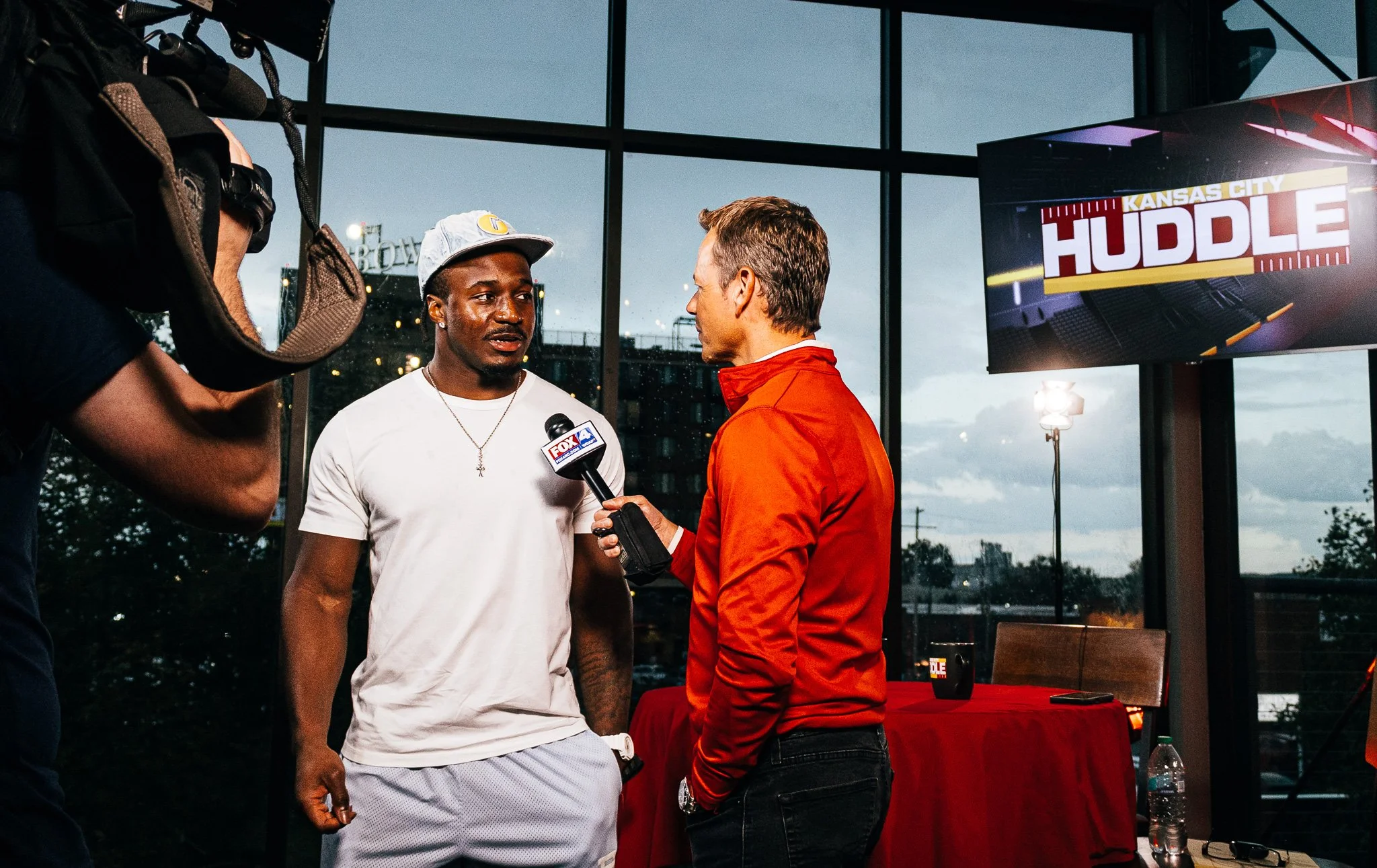 Rob Collins interviewing Jeffrey Bass during Kansas City Huddle at Chicken N Pickle