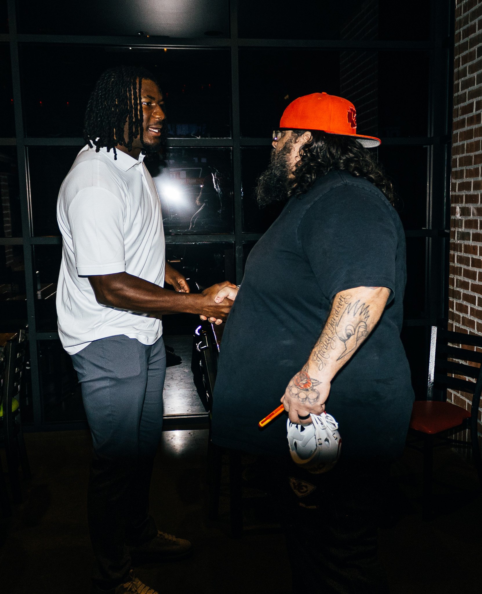 R Mason Thomas shaking hands with a fan during Kansas City Huddle Live taping