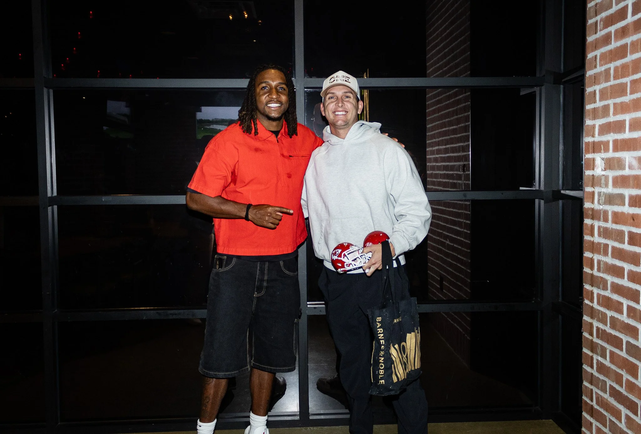 Nohl Williams takes photos with a fan following the October 19 show in Overland Park.