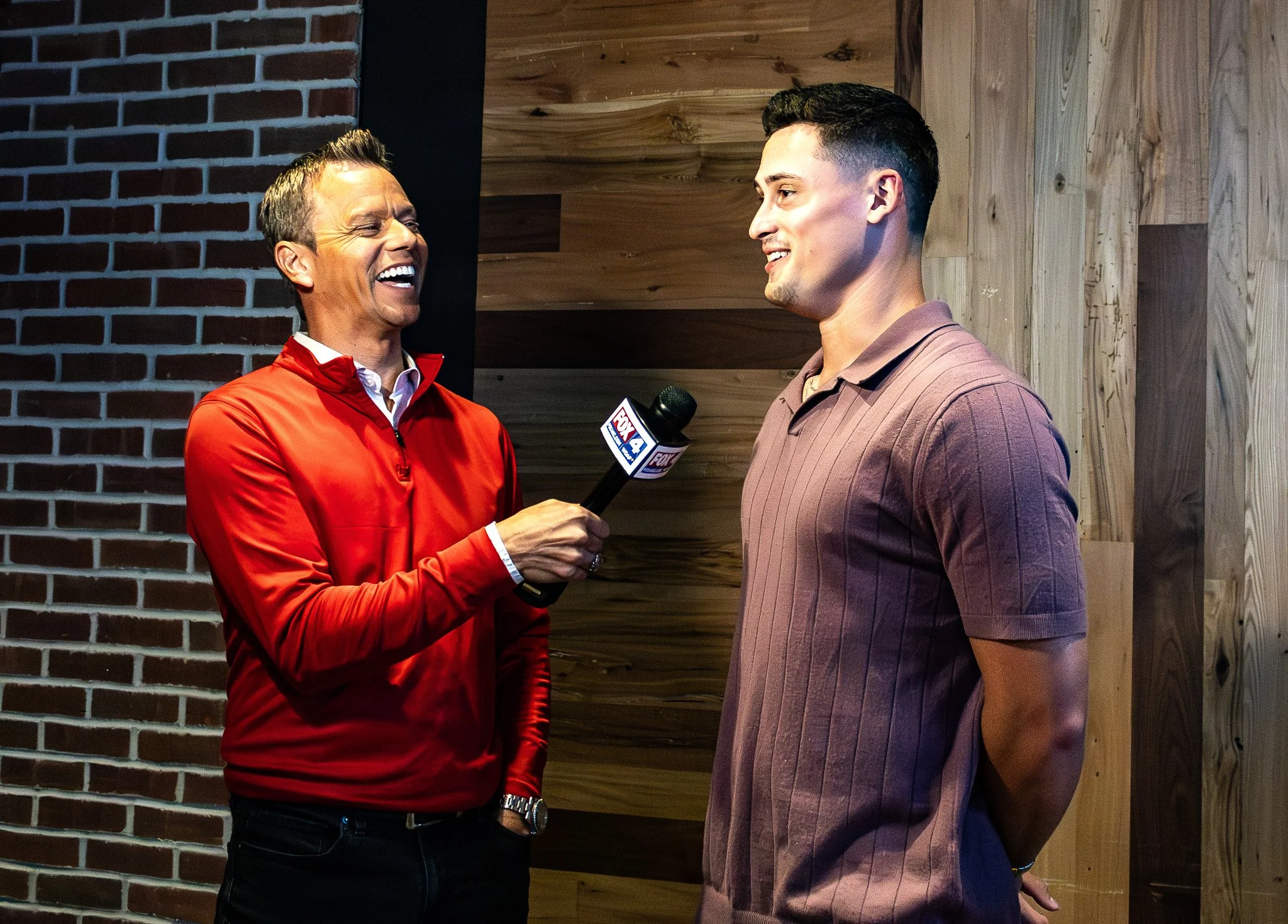 Rob Collins interviewing Matt Araiza during Kansas City Huddle