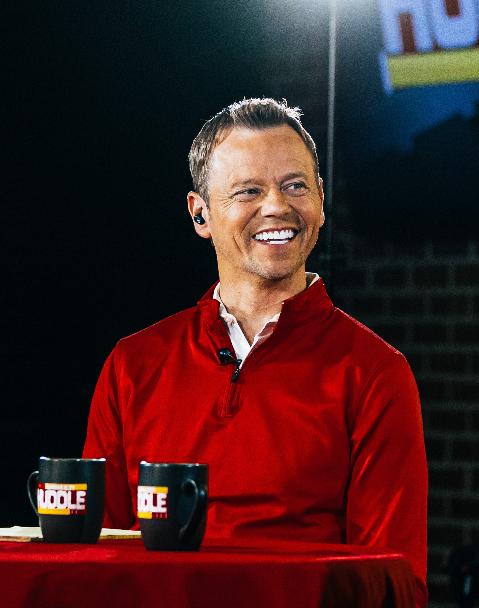 Rob Collins smiles during a live taping of Kansas City Huddle.