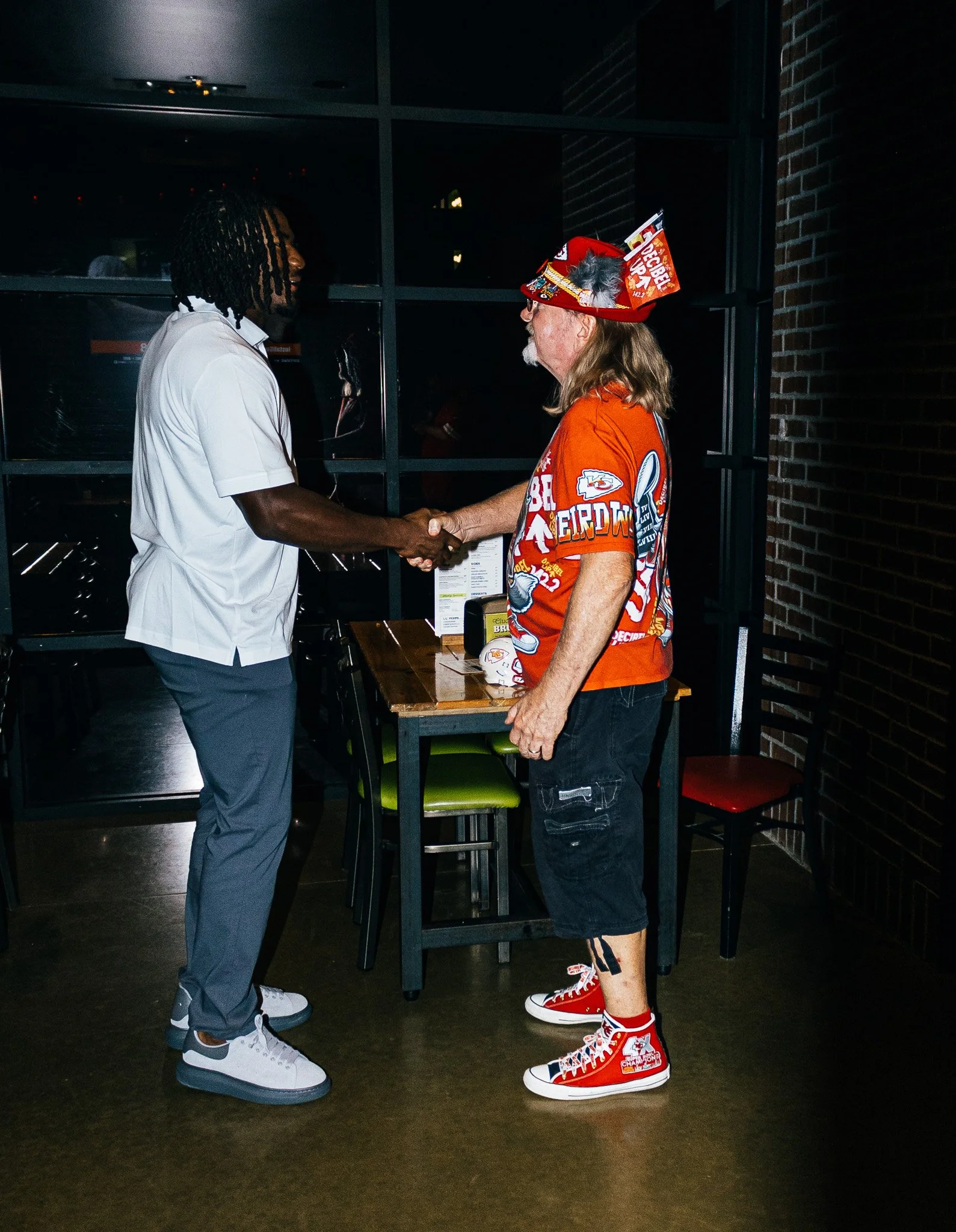 R Mason Thomas shaking hands with a fan during Kansas City Huddle Live taping