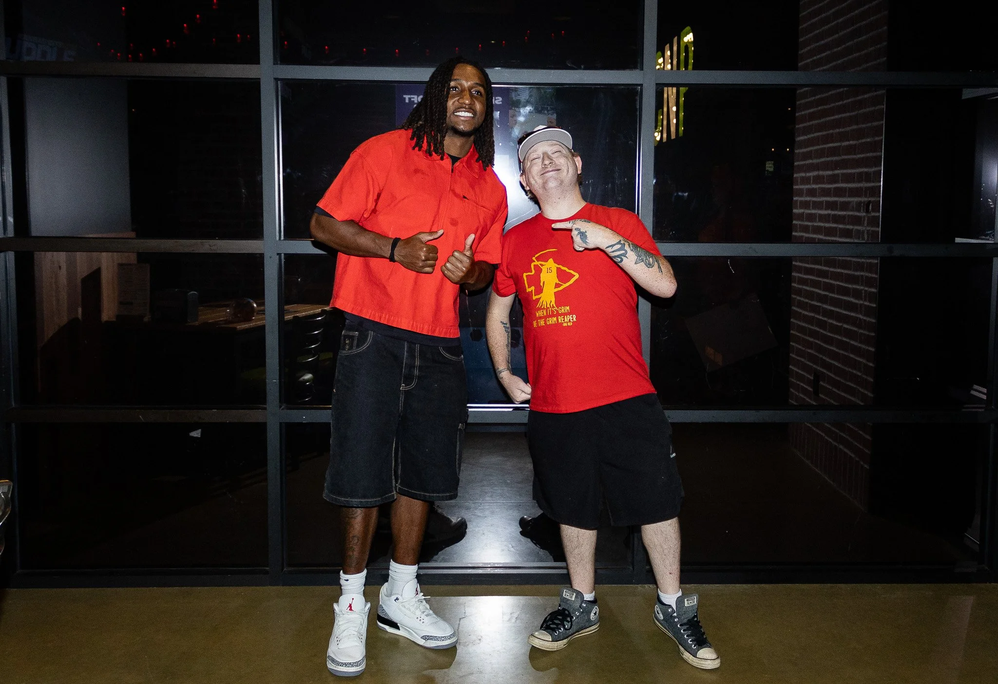 Nohl Williams poses with a fan after Kansas City Huddle live show at Chicken N Pickle Overland Park