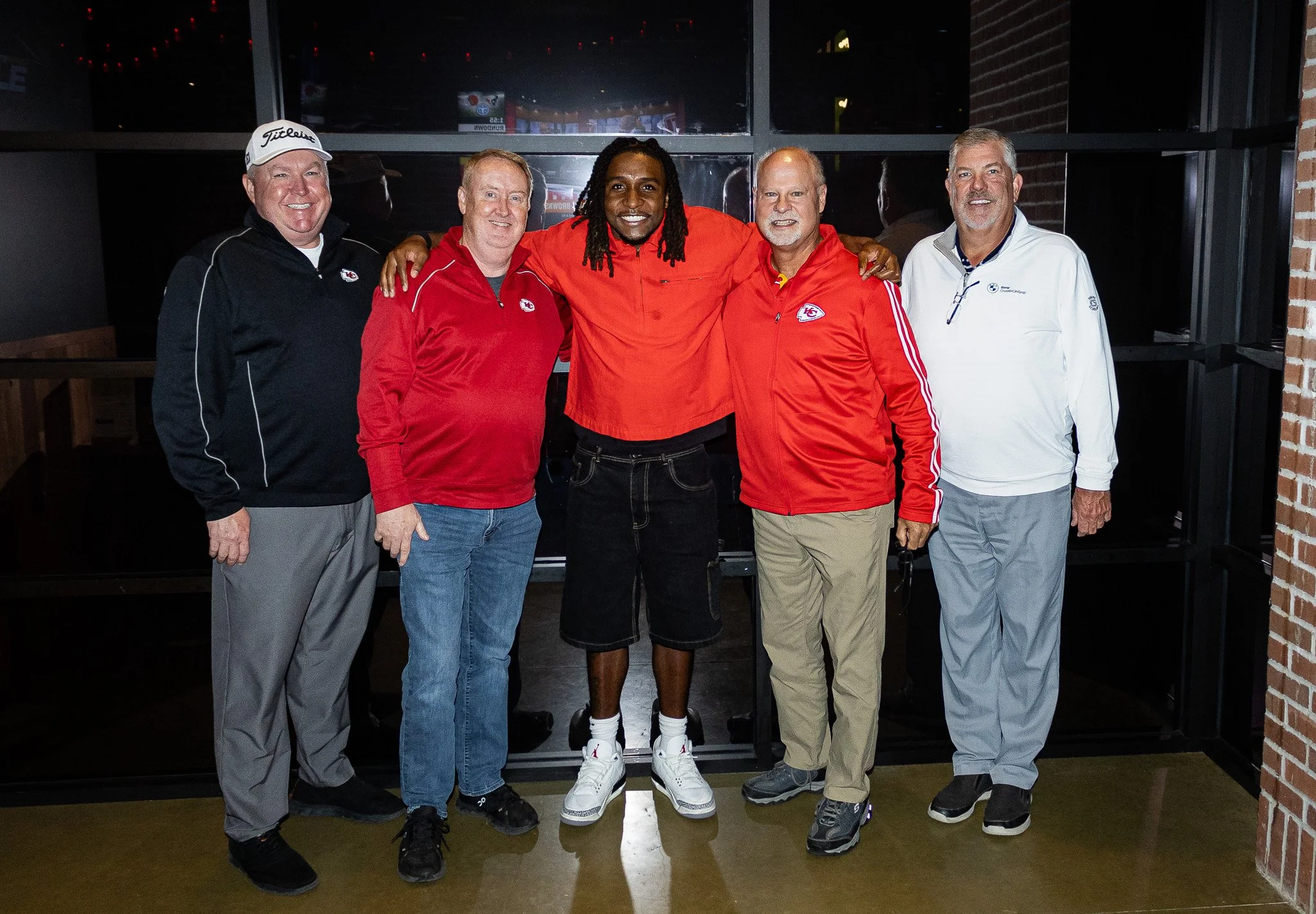 Nohl Williams poses with group of fans after Kansas City Huddle