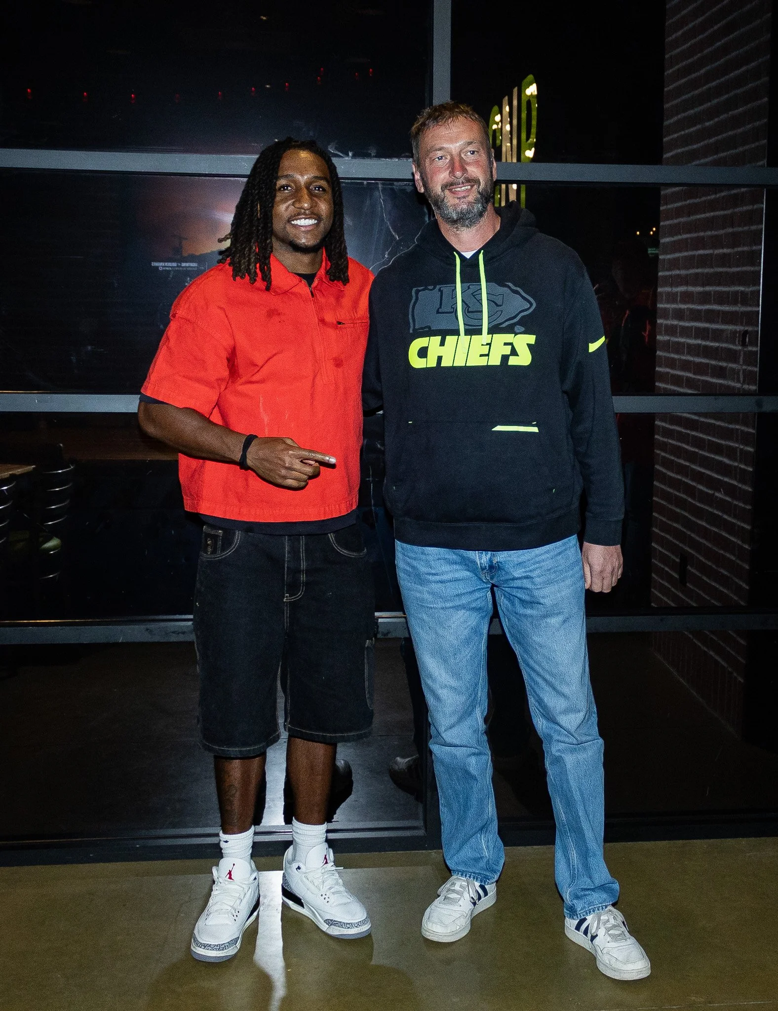 Nohl Williams poses with a fan after the live football show.