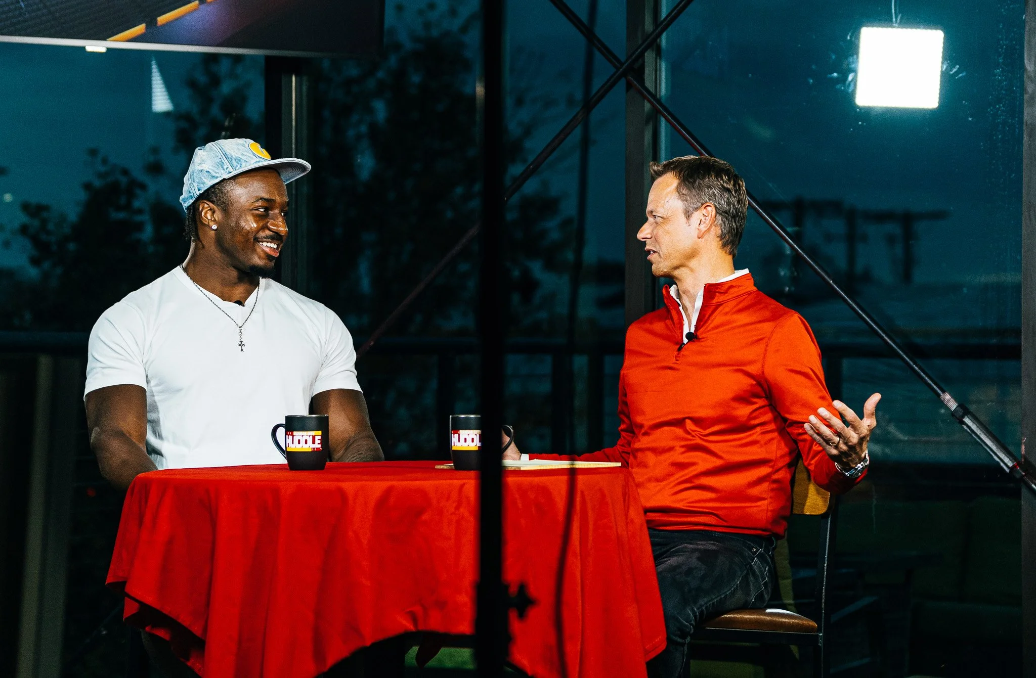 Jeffrey Bassa talking with host Rob Collins during Kansas City Huddle