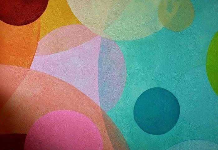 Colorful abstract artwork with overlapping pastel shapes for couples therapy