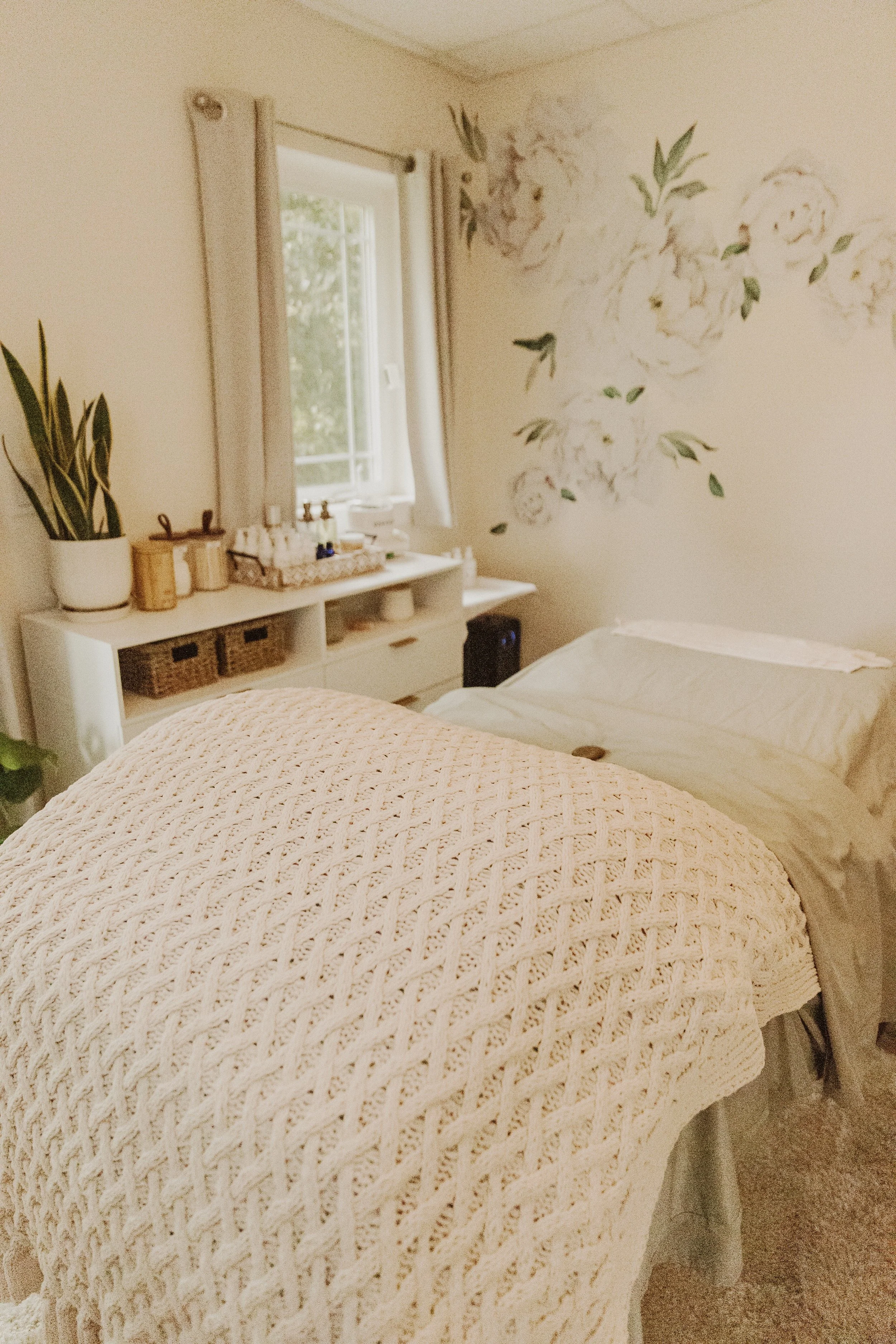 Spa interior with massage table, holistic skincare in Arroyo Grande, California