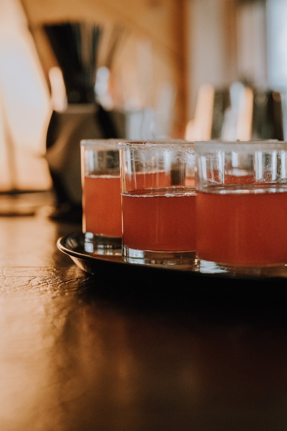 A tray of drinks in the bar at Blackwater Creek Ranch.