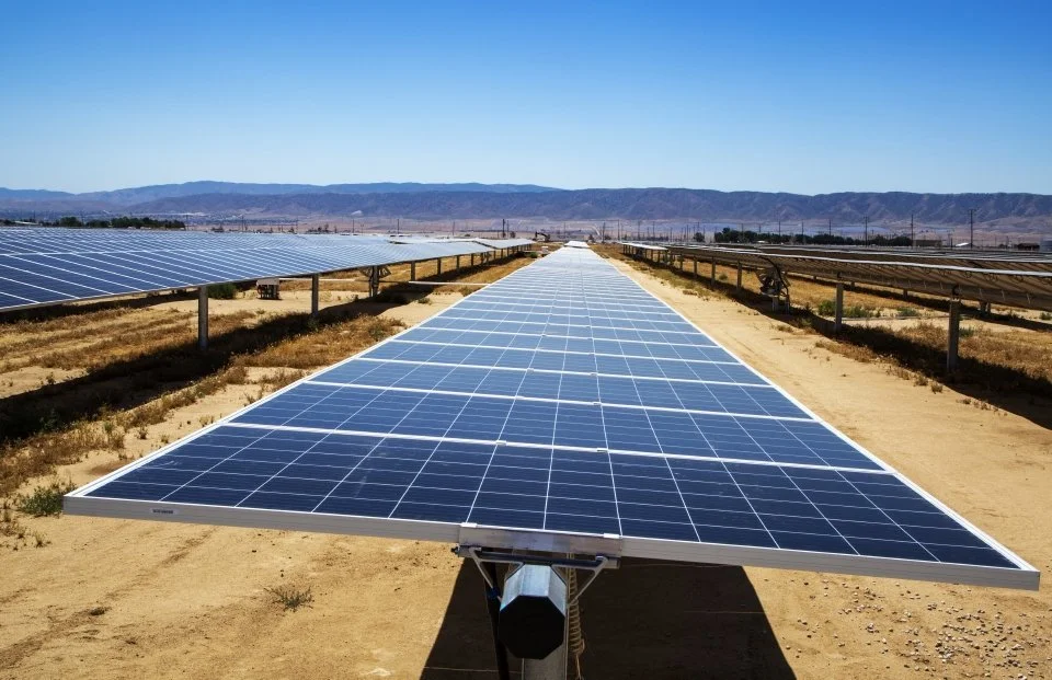 Multiple rows of solar panels to generate clean energy.