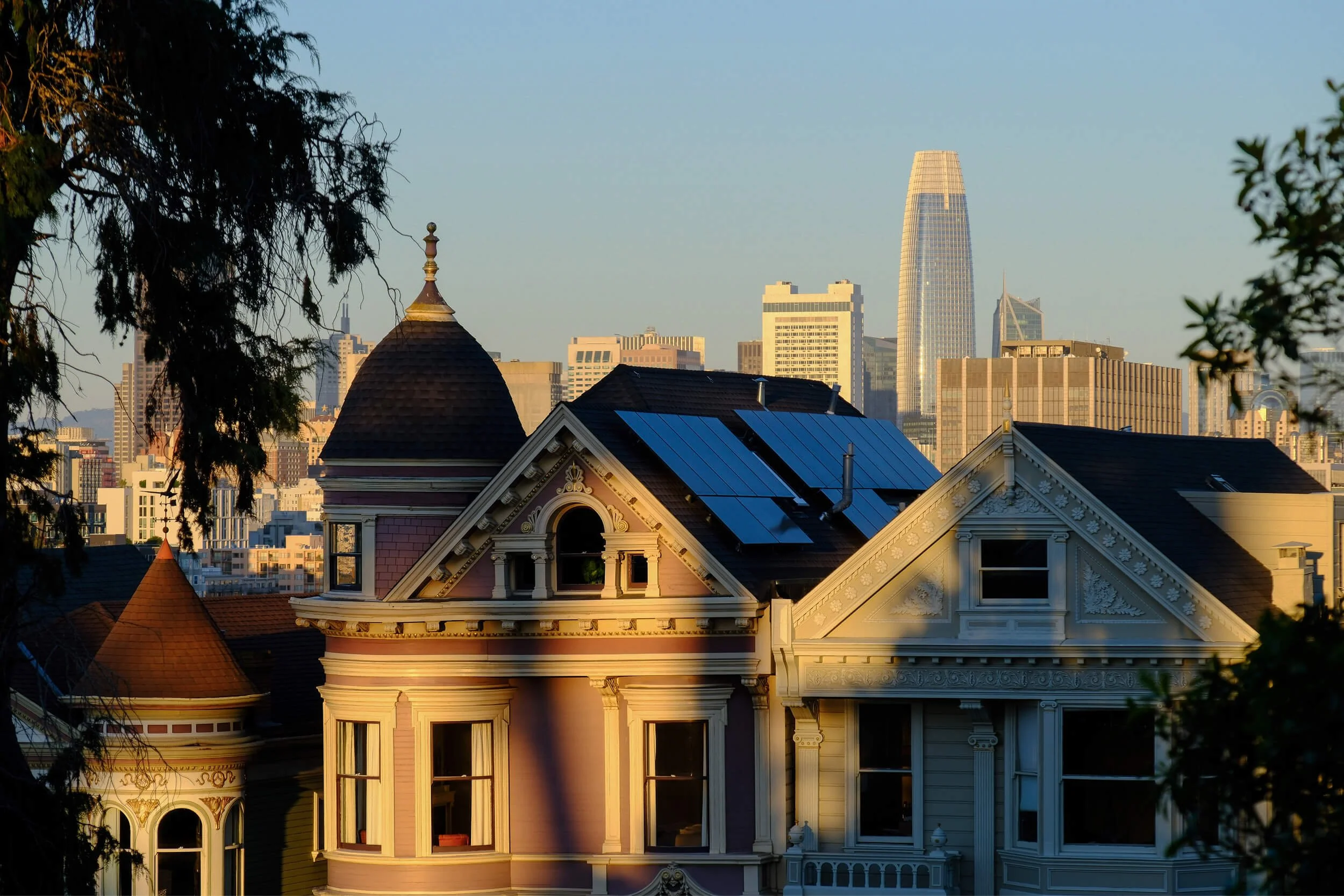 Aerial view of a rooftop that has solar panels.