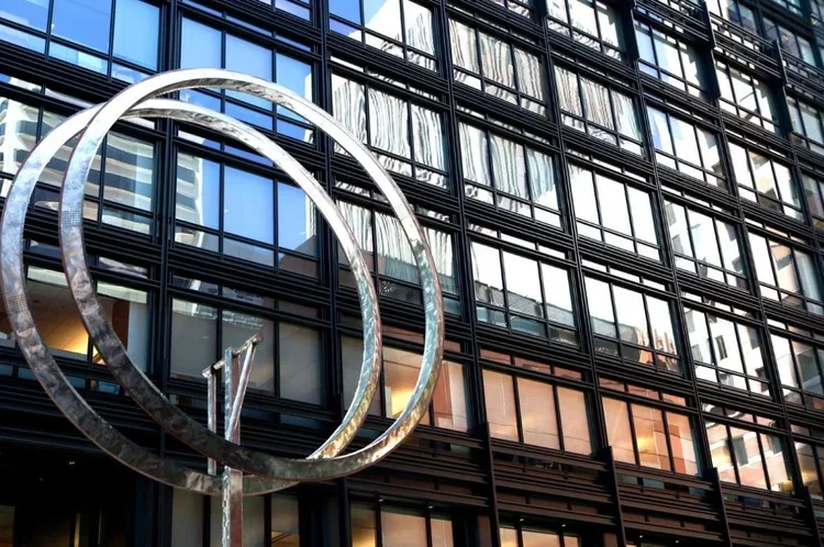 Photo of a kinetic sculpture in front of an office building