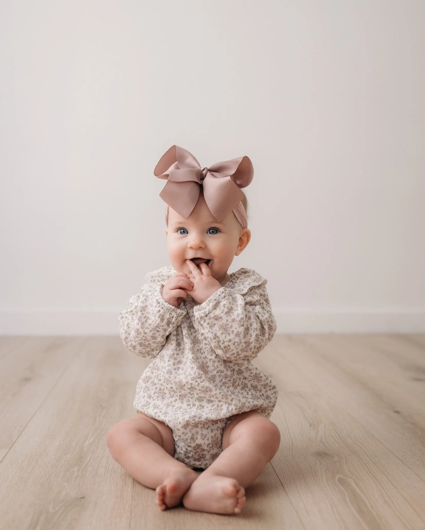 Six months already? My oh my, so much can change in such a short time. One minute she&rsquo;s this tiny newborn curled up in your arms, and now she&rsquo;s sitting up all on her own, grabbing her toes, and flashing the cutest little personality shini