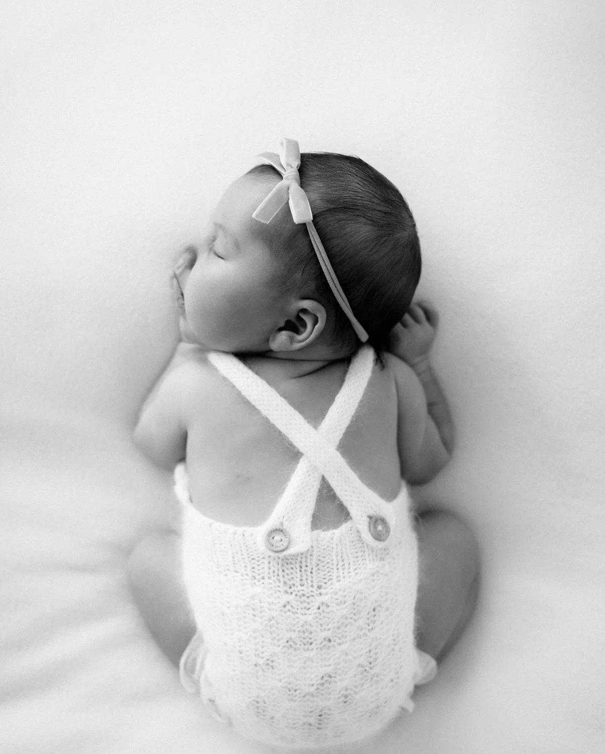 One of the most meaningful parts of this job isn&rsquo;t just photographing babies&mdash;it&rsquo;s walking through life alongside the families who invite me back again and again.

I met this family for the first time in December of 2022, holding the