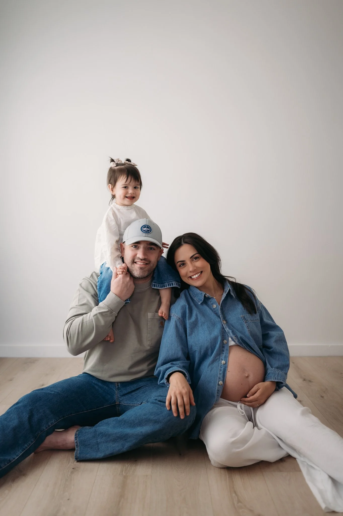 family of three maternity session in houston, texas at studio brae
