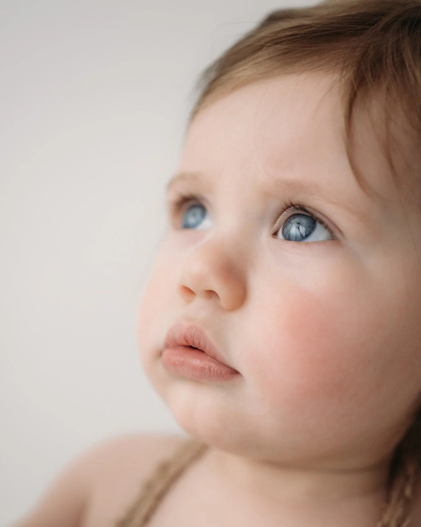 One.
How is she already one?

I know every parent walks through my studio door saying the same thing &mdash; that it went too fast, that they can&rsquo;t believe how much she&rsquo;s changed, that they swear she was just born. And they&rsquo;re right