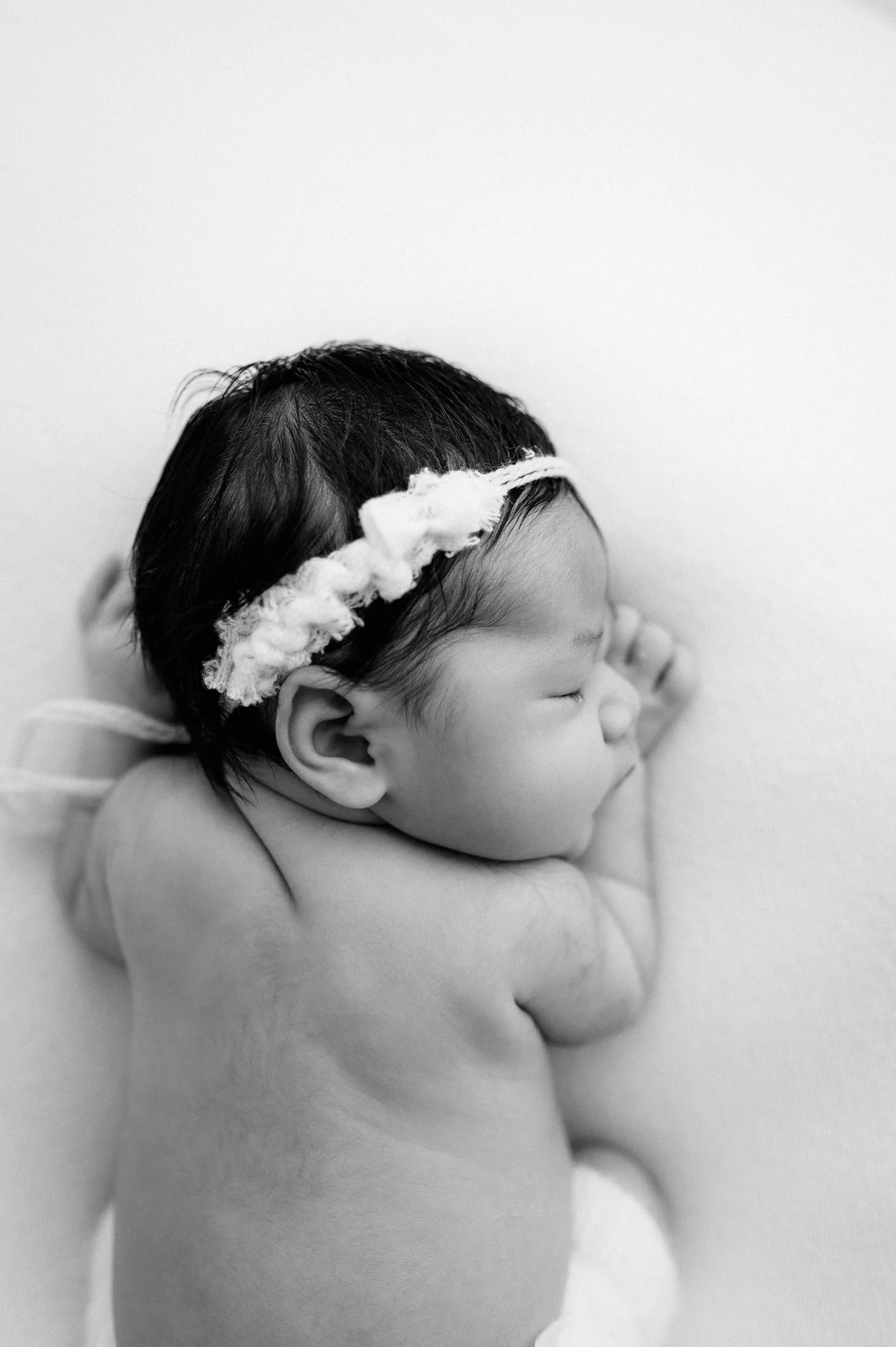baby in black and white photo in the woodlands studio, studio brae