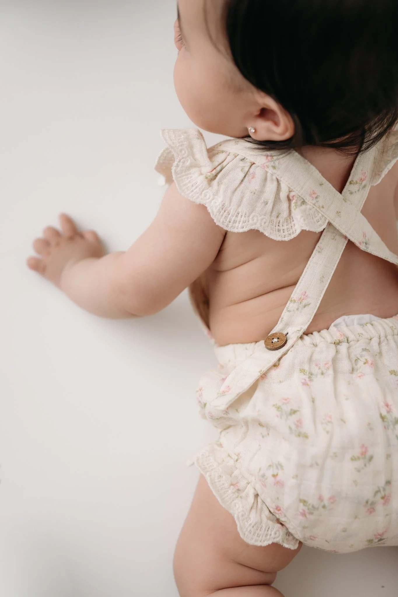 half birthday photo session in an all white studio in the woodlands, texas