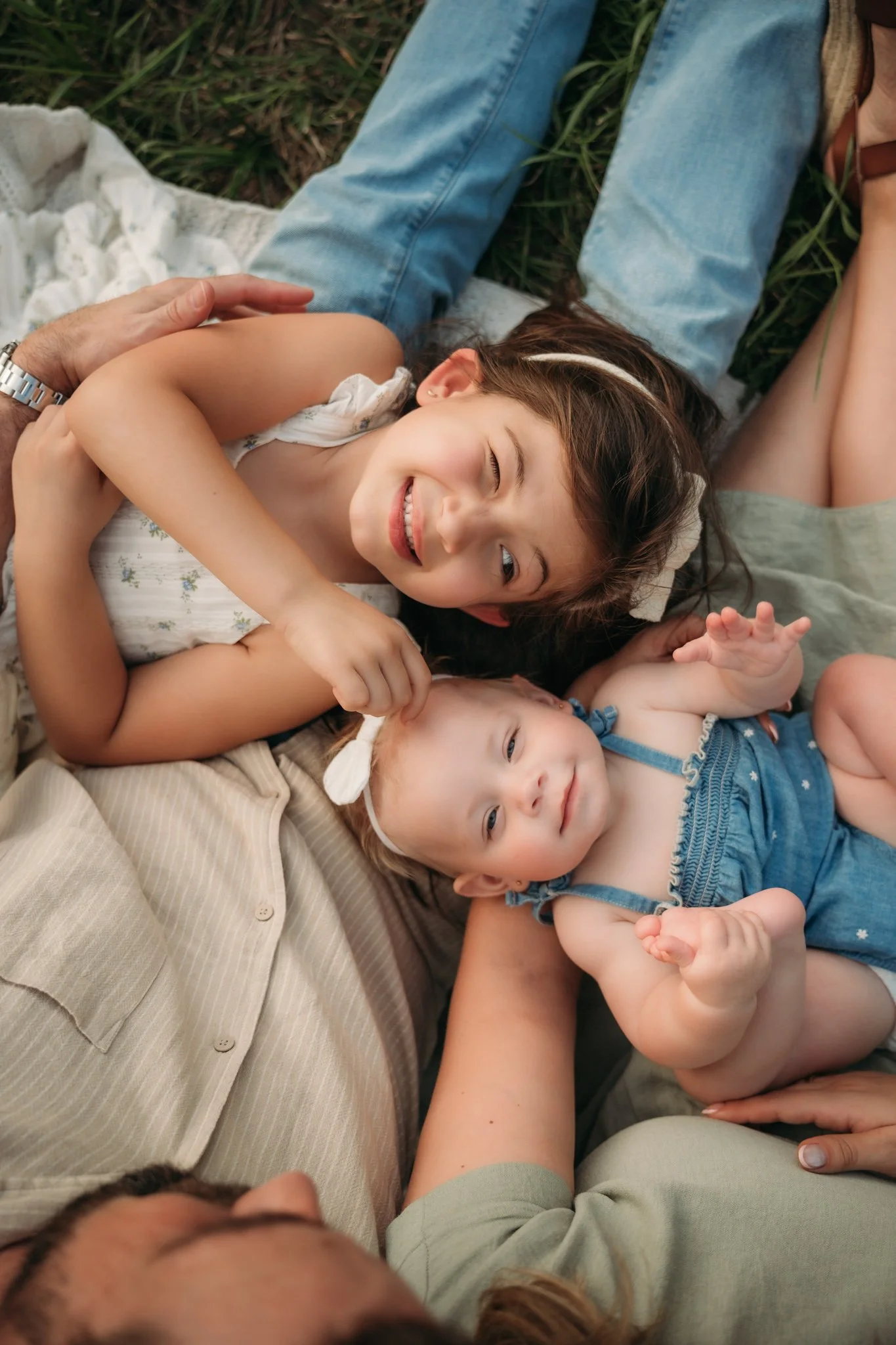 outdoor family photography session with a family of four, by studio brae, family photographer in the woodlands, tx