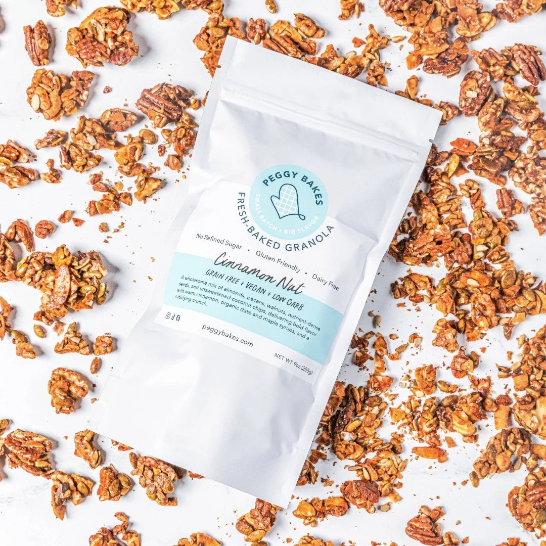 Not a sugary nut mix.

It&rsquo;s Peggy Bakes Cinnamon Nut&mdash;grain-free granola with clusters, deep crunch, and warm cinnamon made for snack boards.

Sweetened just right with dates + maple syrup (no refined sugars) and packed with almonds, pecan
