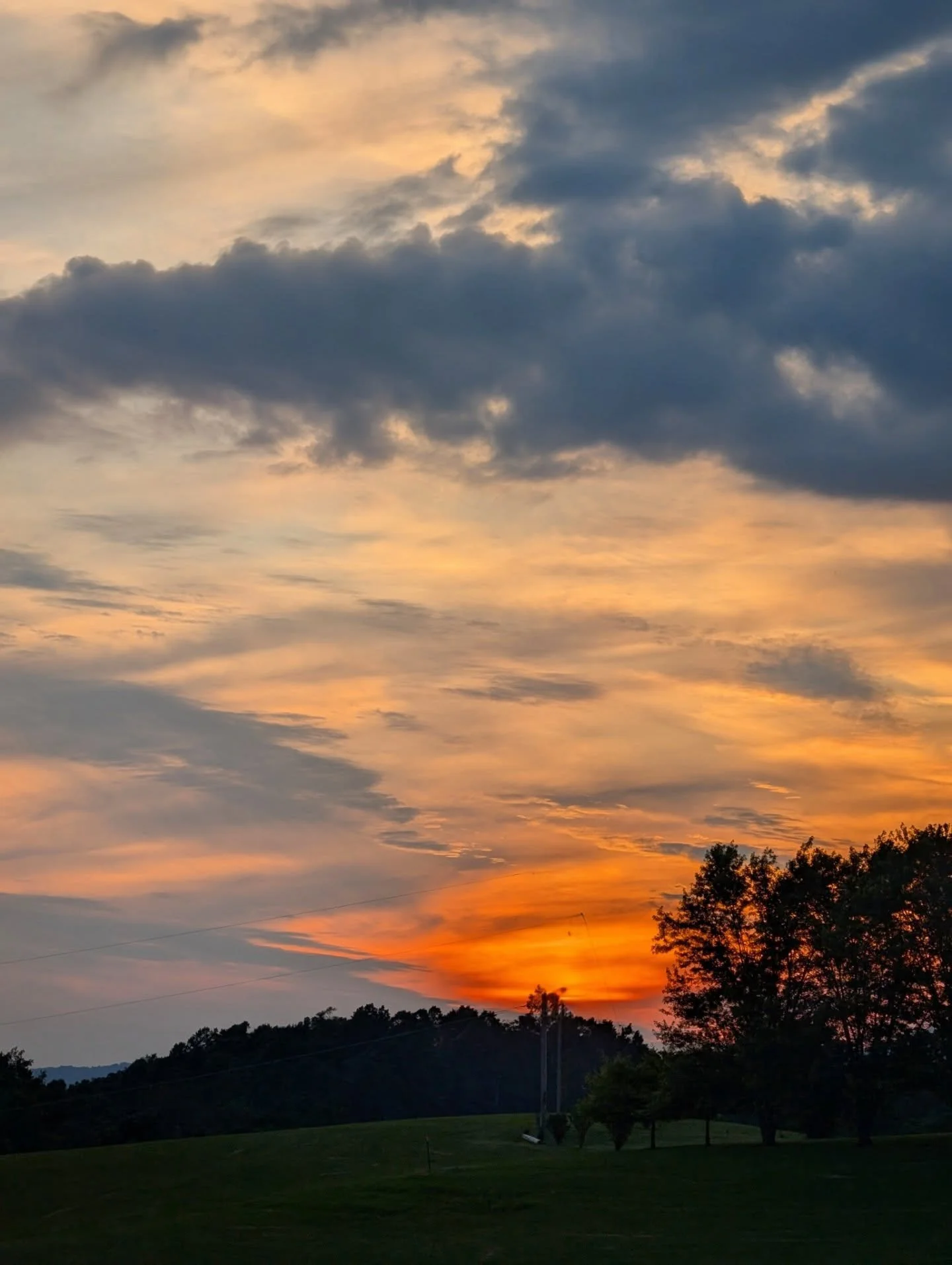Sunset amongst the Storms

#orange #sunset #clouds #silhouette #notallwhowanderarelost