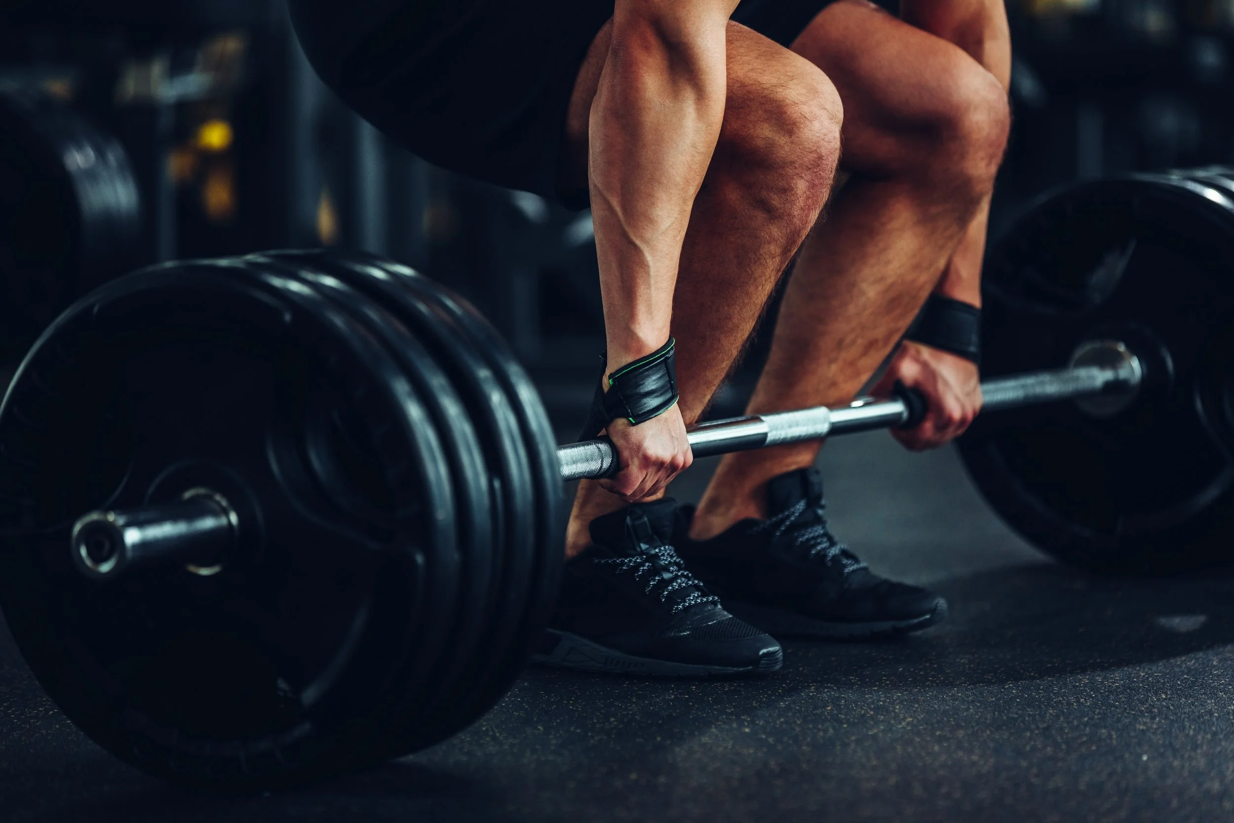 Powerlifting and strength training with a barbell deadlift, focused on building strength and performance.