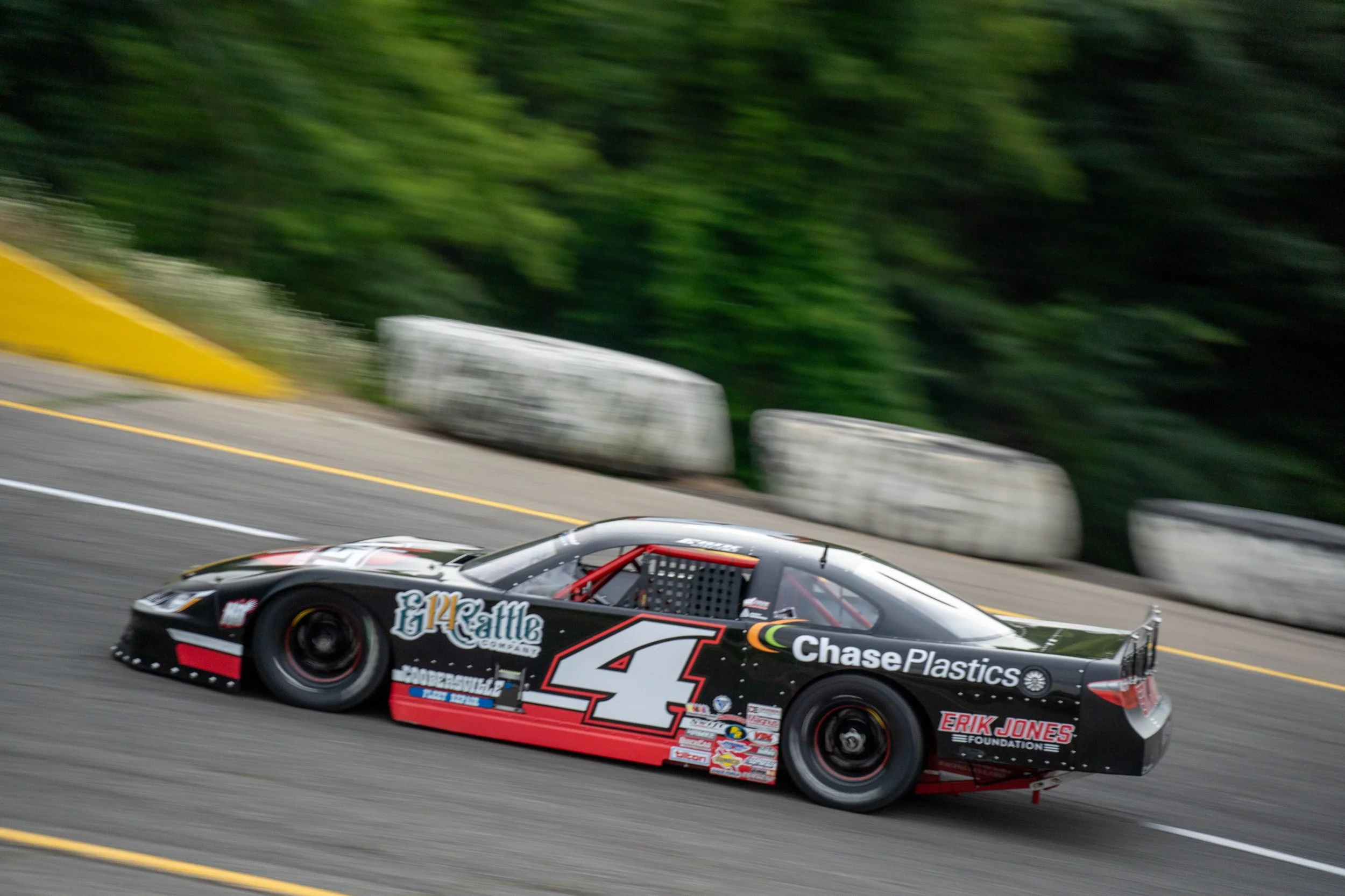 Erik Jones drives his no. 4 super late model at the Money in the Bank 150 at Berlin Raceway in 2024