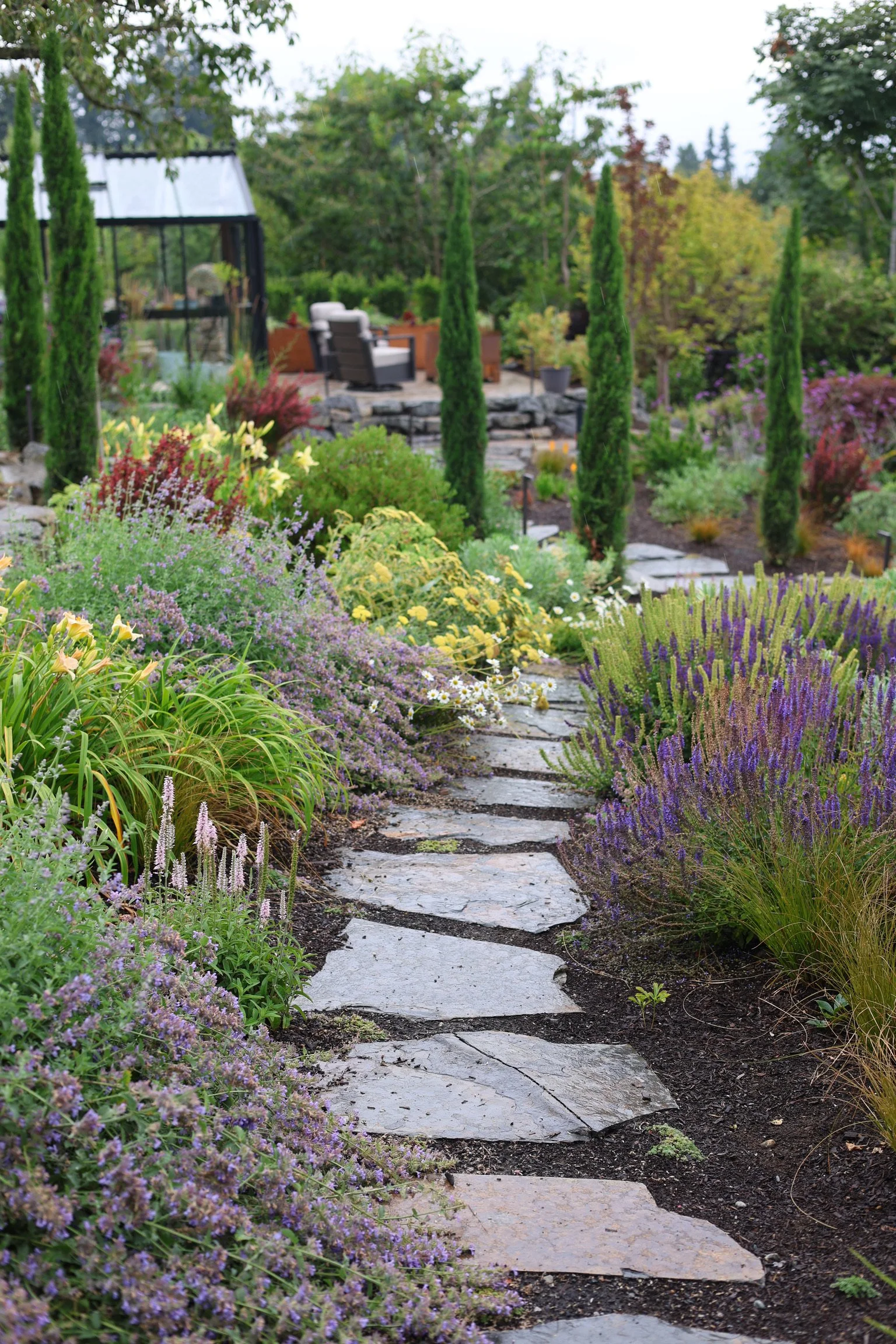 New flagstone through the garden pulled all the garden rooms together.