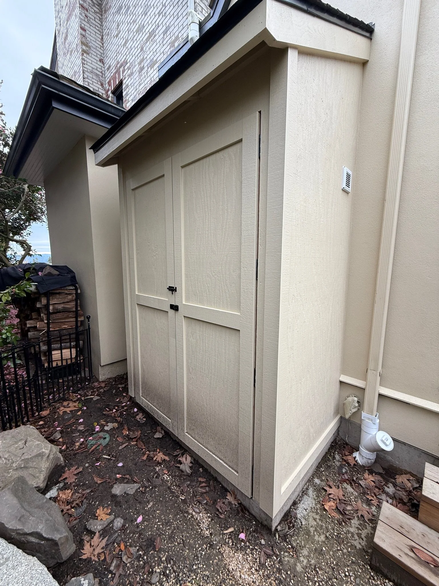 A custom shed was designed to hold all the outdoor cushions through the rainy season.