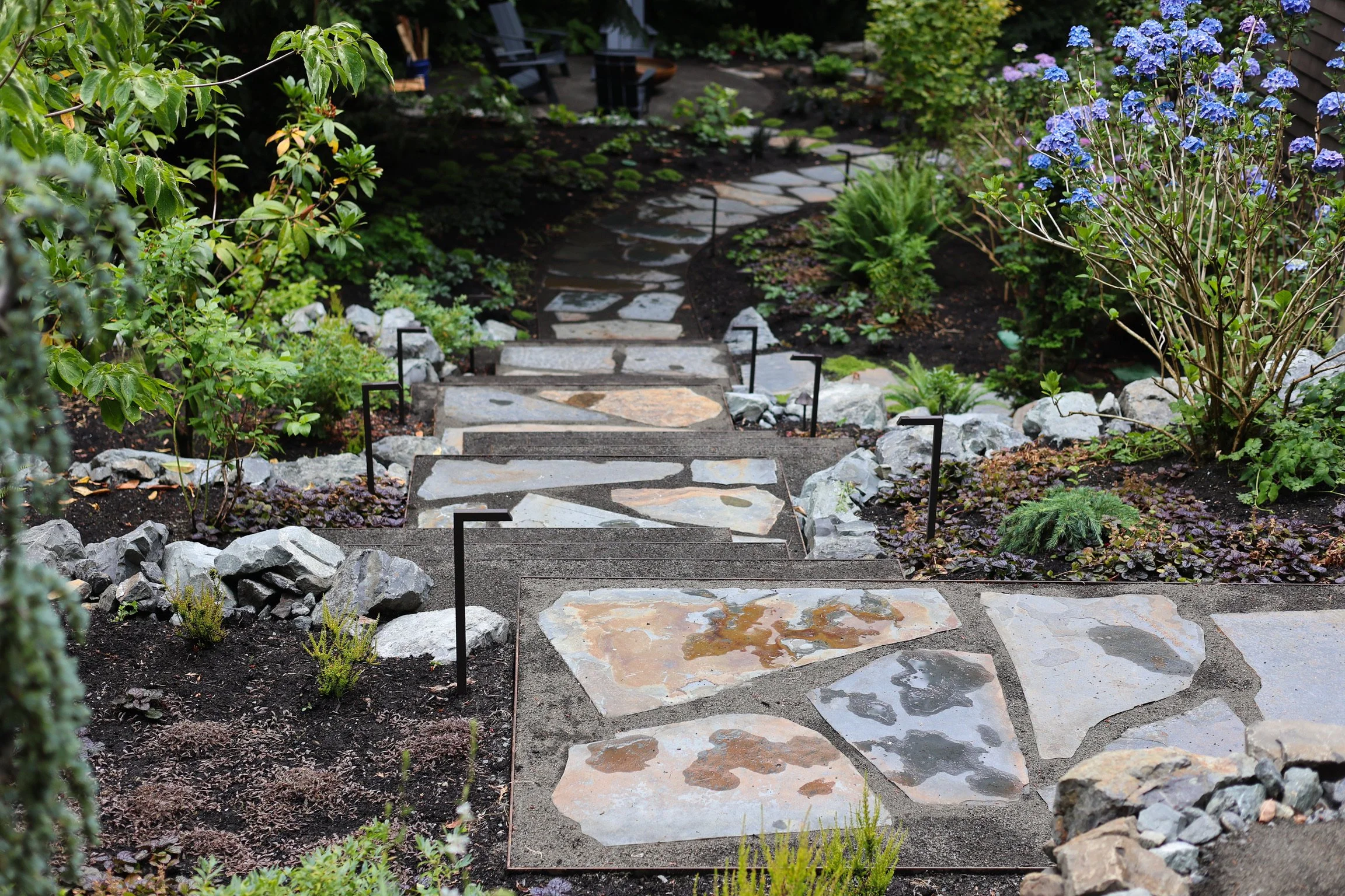 Not only do the new steps create a safe easy way to access the back garden, they are now a focal point.