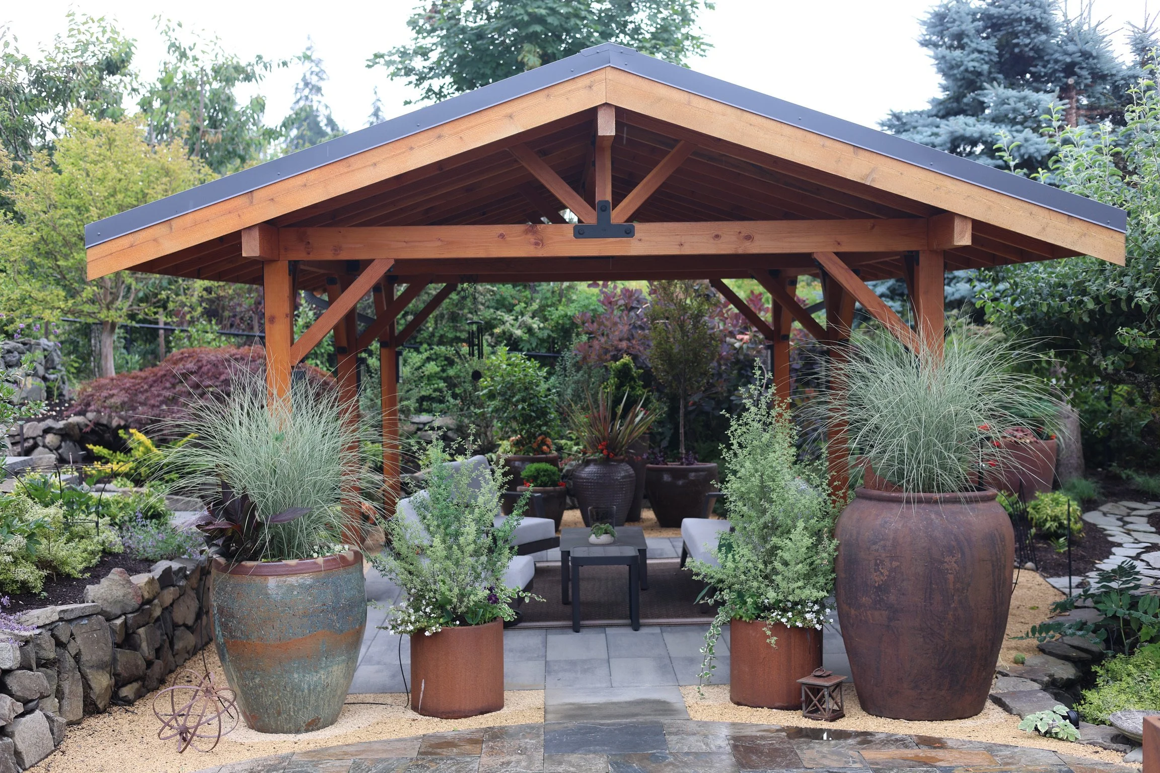 Plants flank and soften the space.