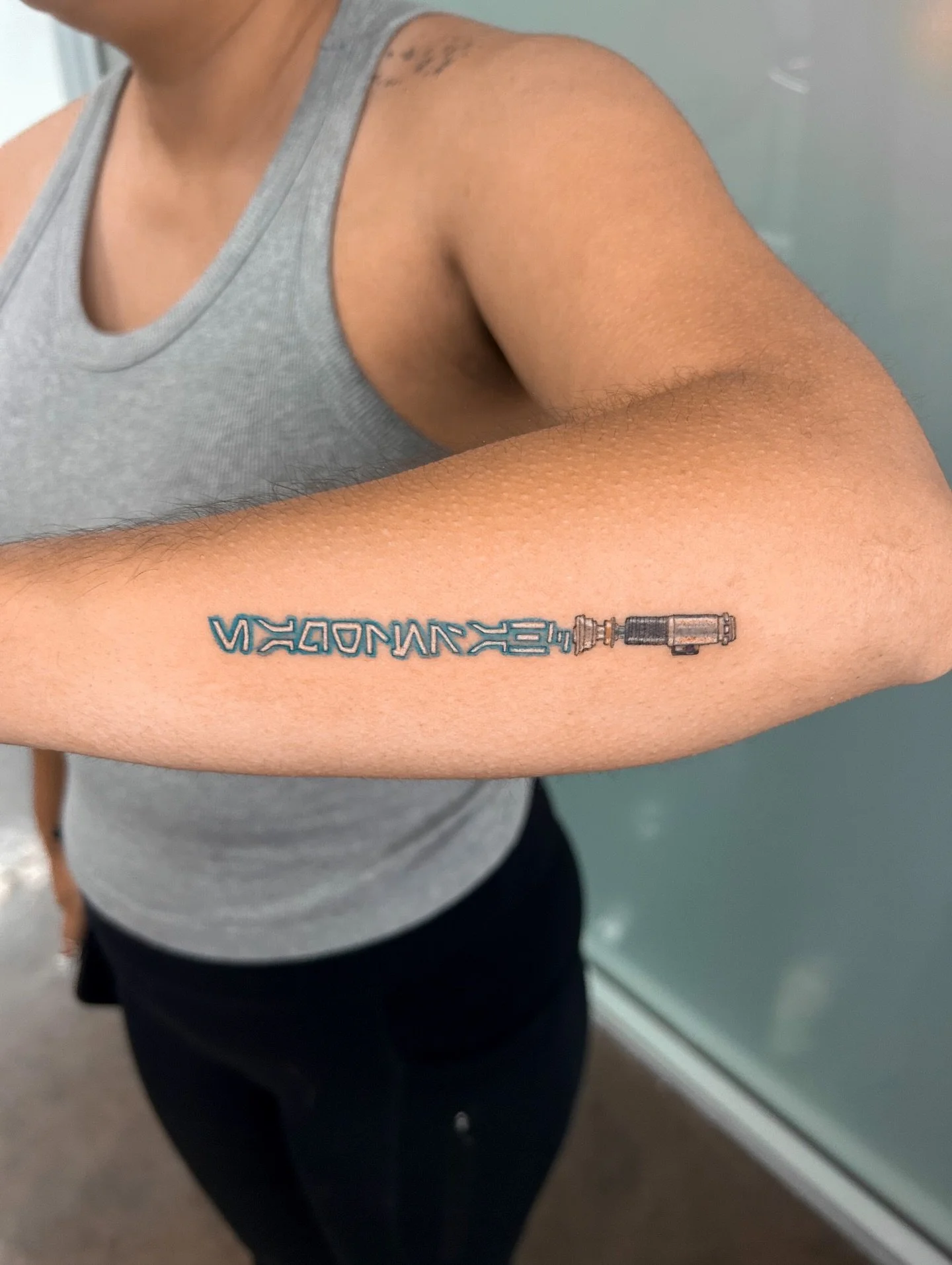 Custom lightsaber with her brother&rsquo;s name Chase Logan in Aurebesh. So cool! ✨

DM me or visit the link in my bio to book your next custom or flash tattoo 💌
Currently booking for March-May (Jan and Feb are fully booked) 🗓️
Located in Orange Co