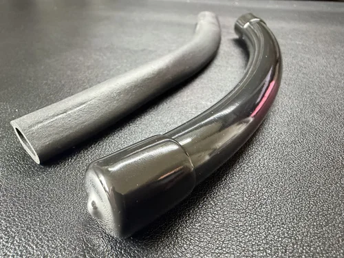 Collapsed hollow factory Jeep door-seal insert beside a fuller Jeep Noodle compression insert