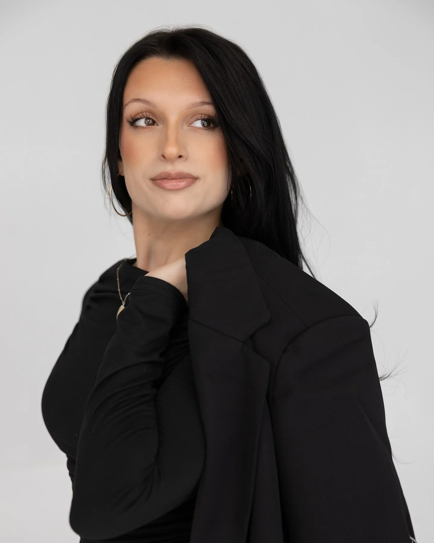 Meet Alyssa 

Alyssa is a creative force behind the chair, known for her warm energy, and eye for transformation. She specializes in natural-looking extensions, lived-in blondes, and seamless balayage, bringing precision and creativity to every appoi