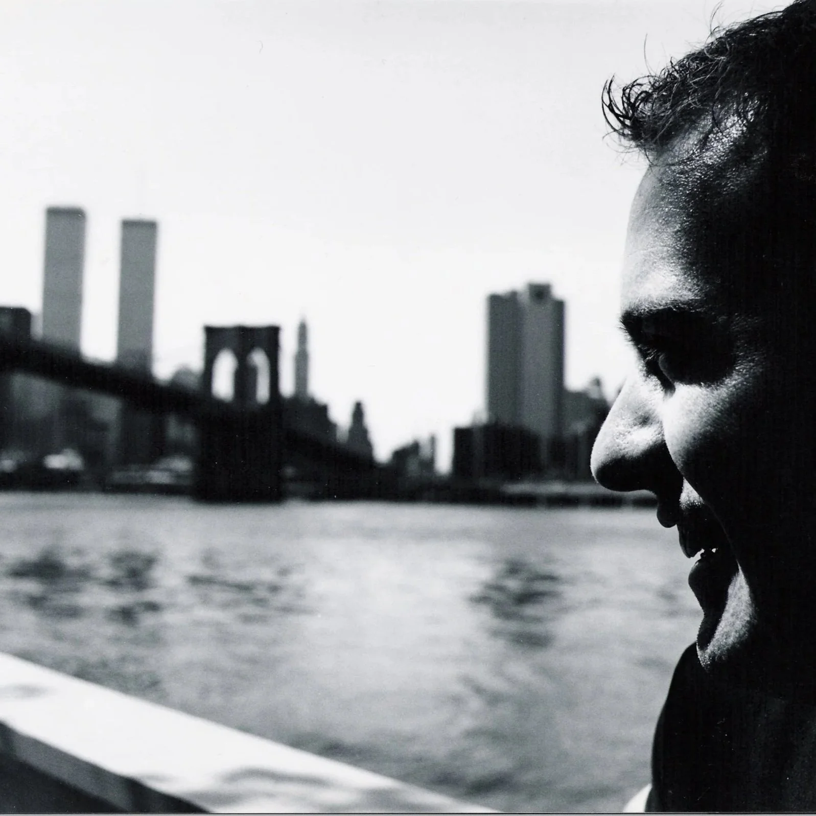 The author looks from DUMBO, in Brooklyn, over the East River towards the Twin Towers, 1999 (Photo by Joseph Beatty).