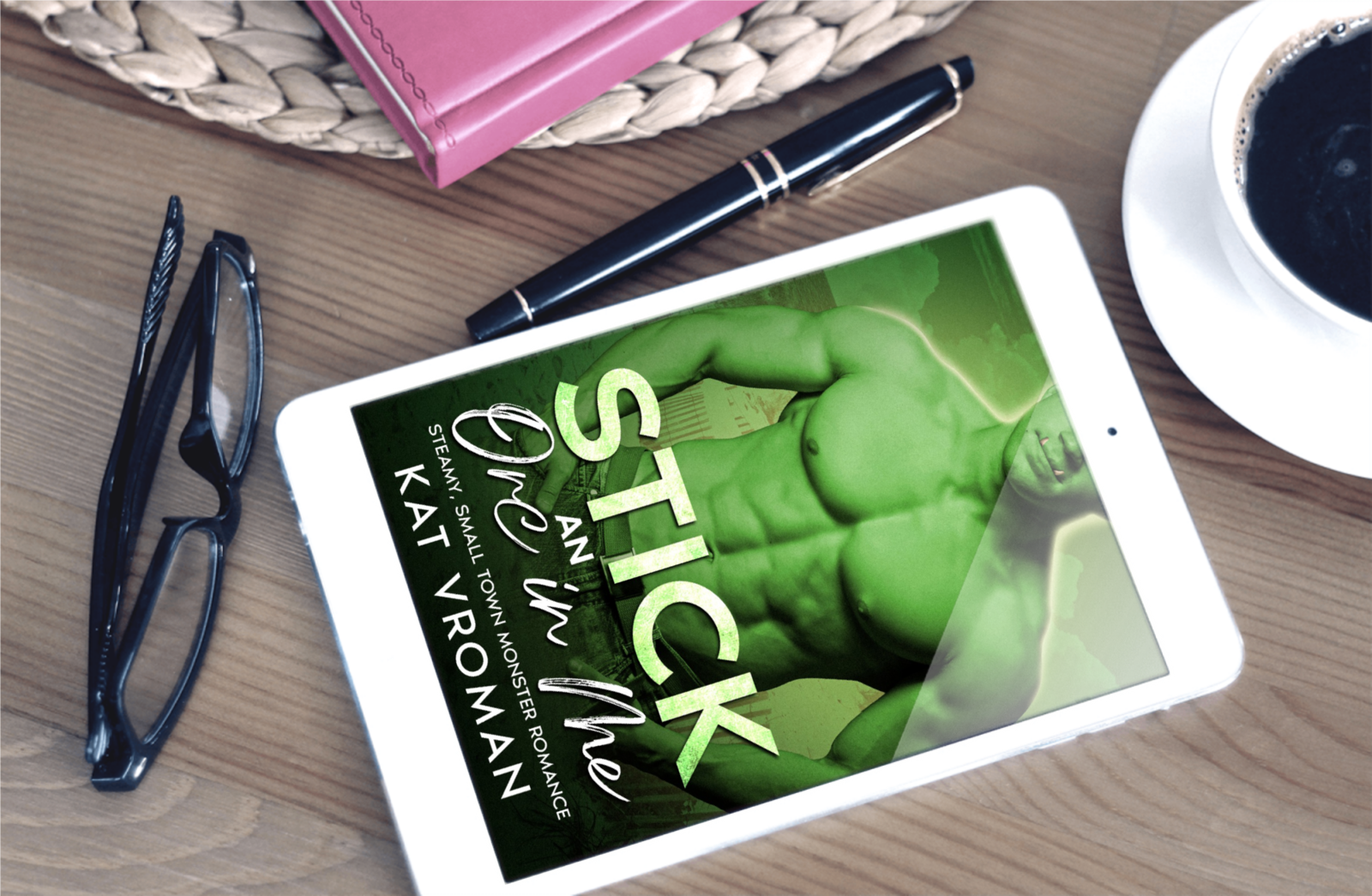 Stick an Orc in Me by Kat Vroman on tablet with glasses and pen