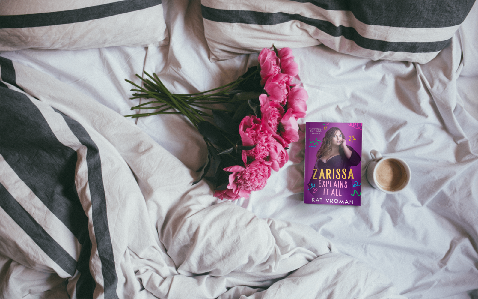 Zarissa Explains It All by Kat book on bed with pink flowers and coffee