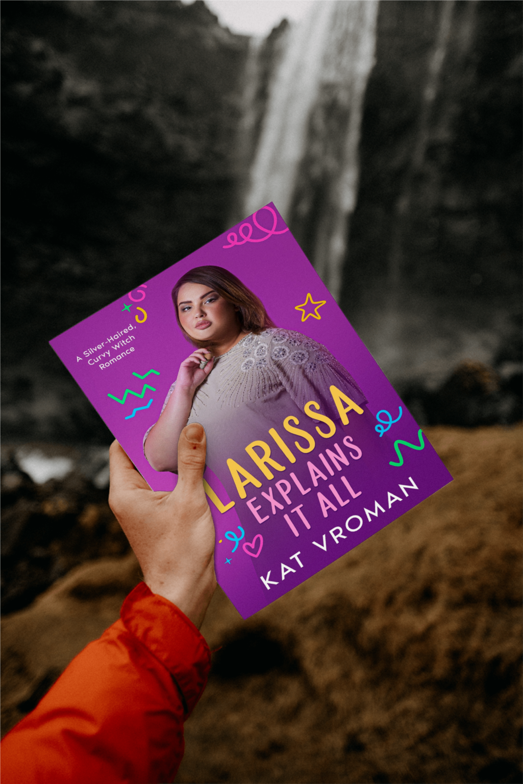 Larissa Explains It All by Kat Vroman held by woman by waterfall
