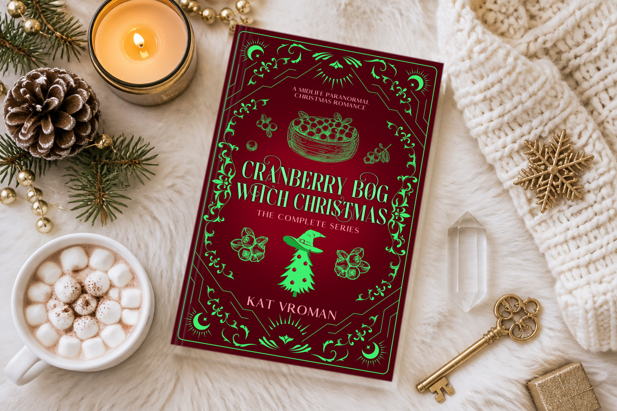 Cranberry Bog Witch Christmas: The Complete Series by Kat Vroman with hot cocoa, pine cone, candles