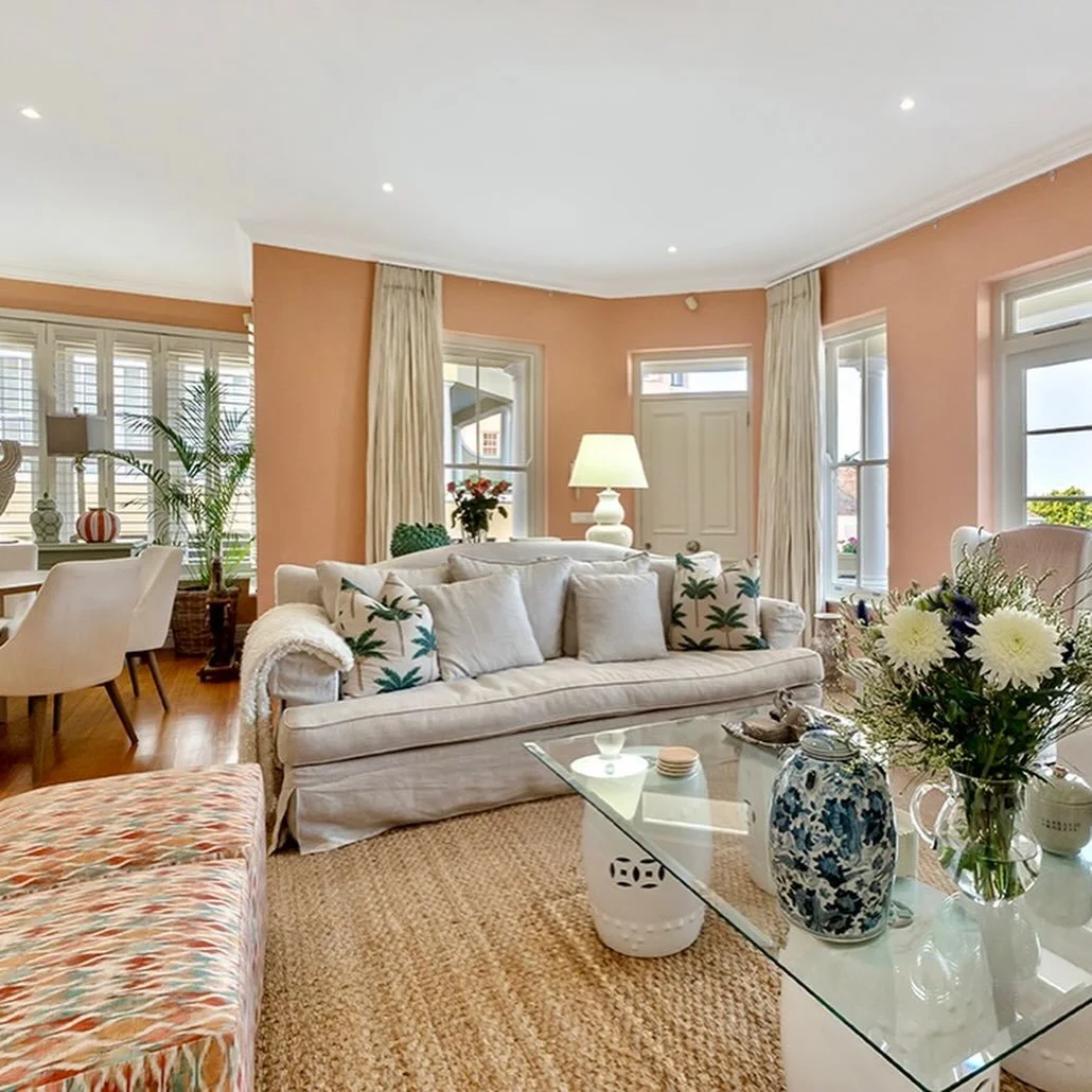 Discover coastal living at its finest.

This luxurious townhouse rests in the vibrant heart of Kalk Bay, perfectly positioned opposite the iconic harbour and framed by sweeping seaside views. Styled in the elegant Joe de Vivere aesthetic, every corne