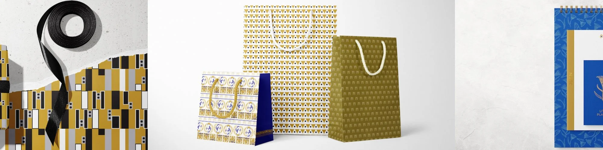 Three gift bags, with various designs on them