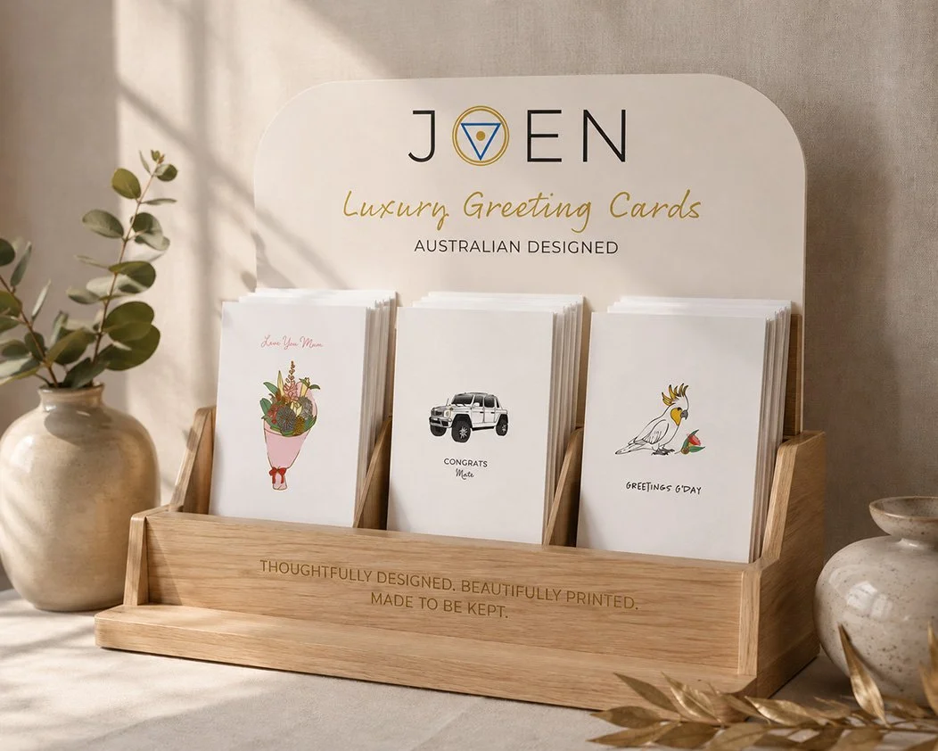 Card display with three card, handrawn illustrations on the cards