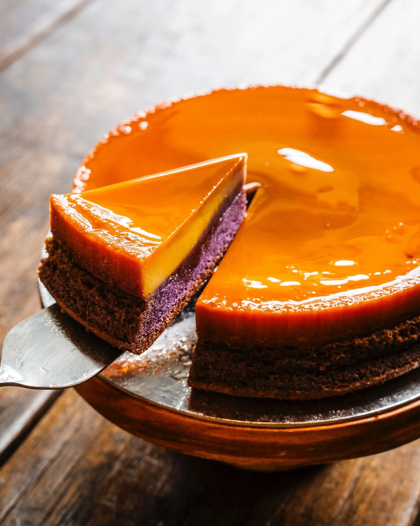 A modern take on a Filipino classic.

Our Ube Flan Cake layers creamy leche flan over soft be sponge, a dessert that is both nostalgic and new.

Handcrafted daily, served with heart, and best enjoyed with your favourite brew.

#MorenoCafe #UbeFlanCak